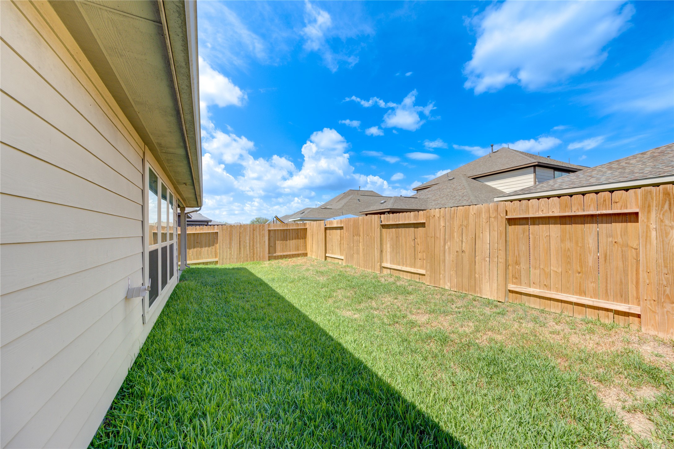 nice backyard with cover patio for family gathering