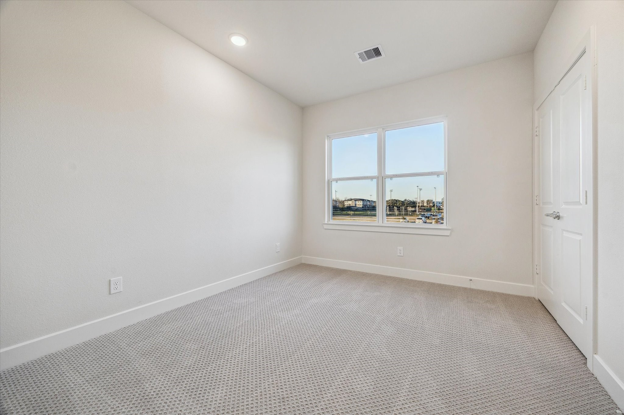 Representative photo of a secondary bedroom. Layout and selections may vary.