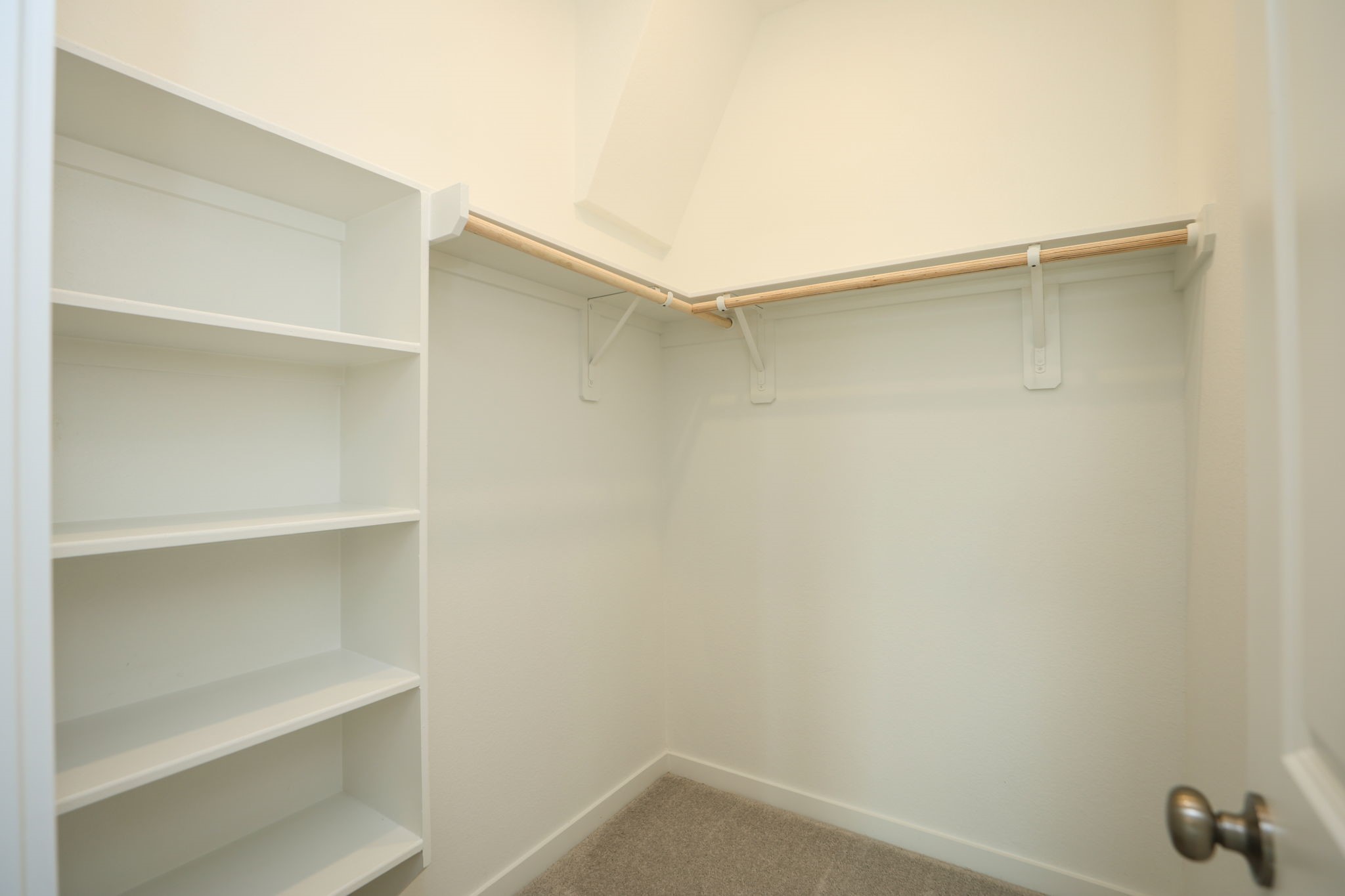 Primary walk in closet.