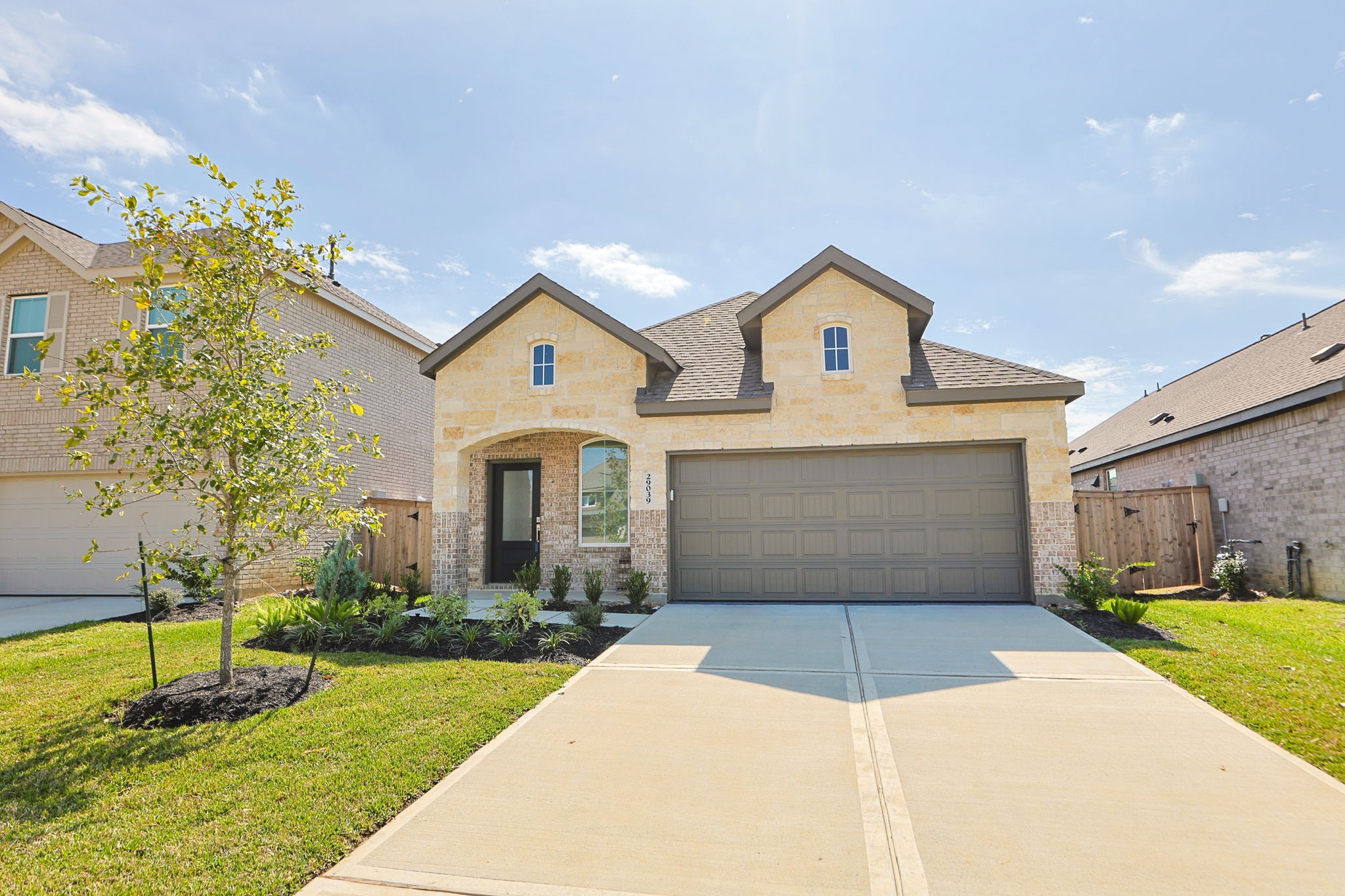 The home has attractive flower beds.