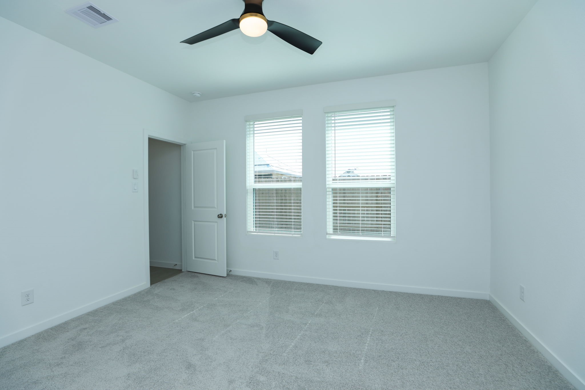 Every bedroom has a ceiling fan.