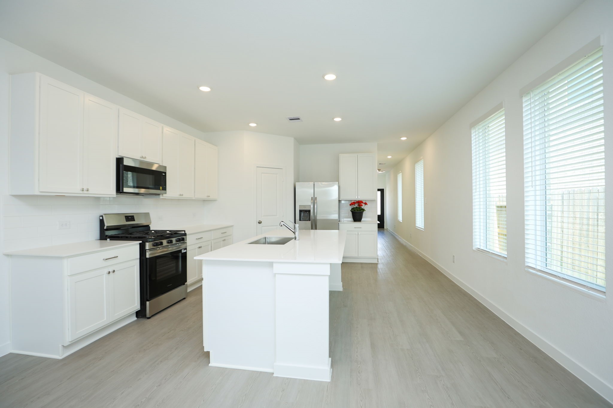 Stainless steel appliances. The refrigerator is included.