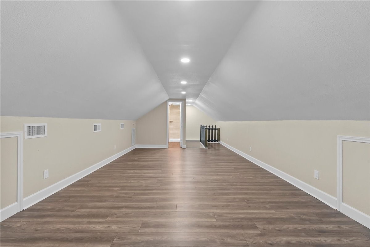 Spaces like this are hard to find! This unique upstairs garage retreat adds incredible versatility and value to the property, offering a separate area that can evolve with your needs, from guest accommodations to a hobby space, office, or entertainment zone.
