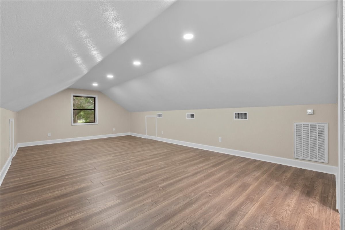 The upstairs garage flex space offers incredible versatility with its own dedicated AC, a large window bringing in natural light, and a private full bathroom. Perfect for a guest space, hobby space, home gym, office, or additional living area, this unique bonus space adapts to fit your lifestyle.