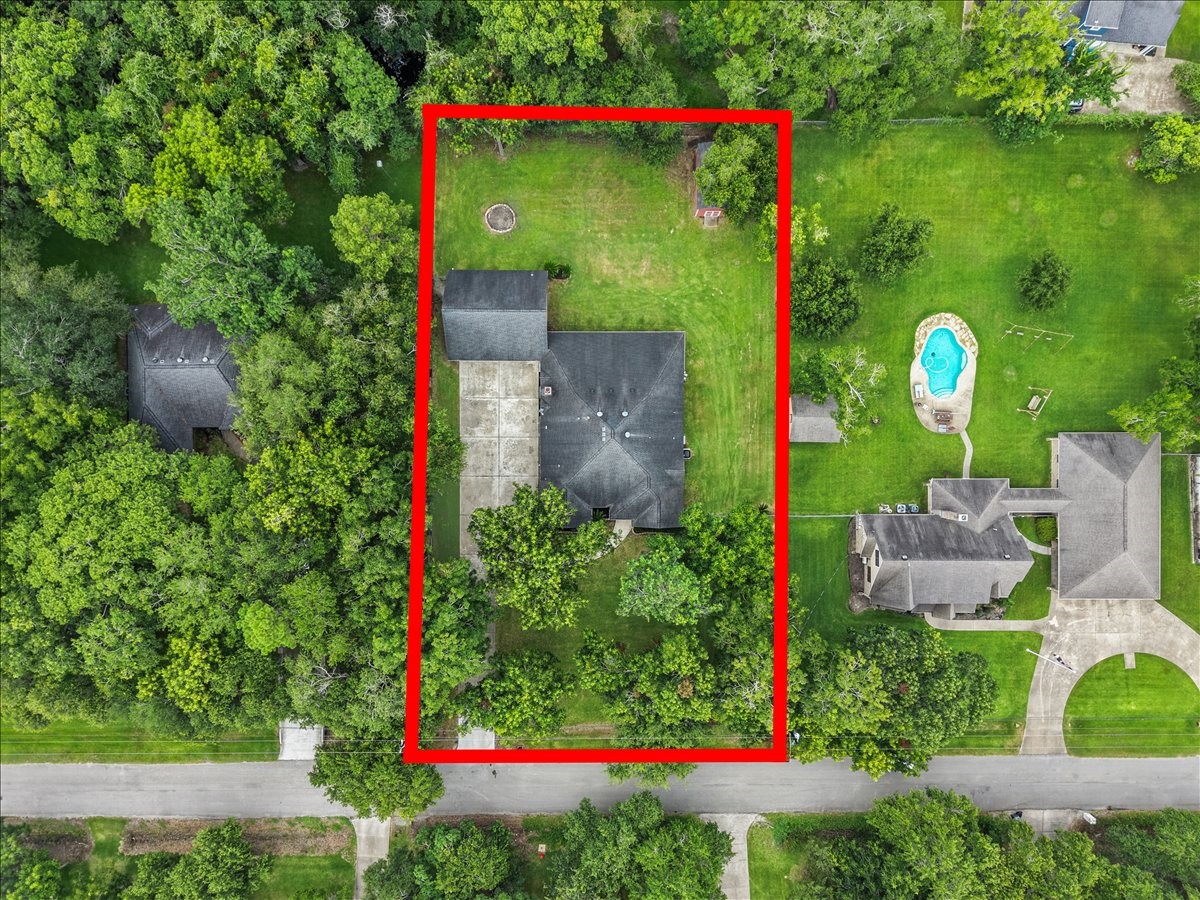 Home sits on .662 of an acre; surrounded by Beautiful Trees