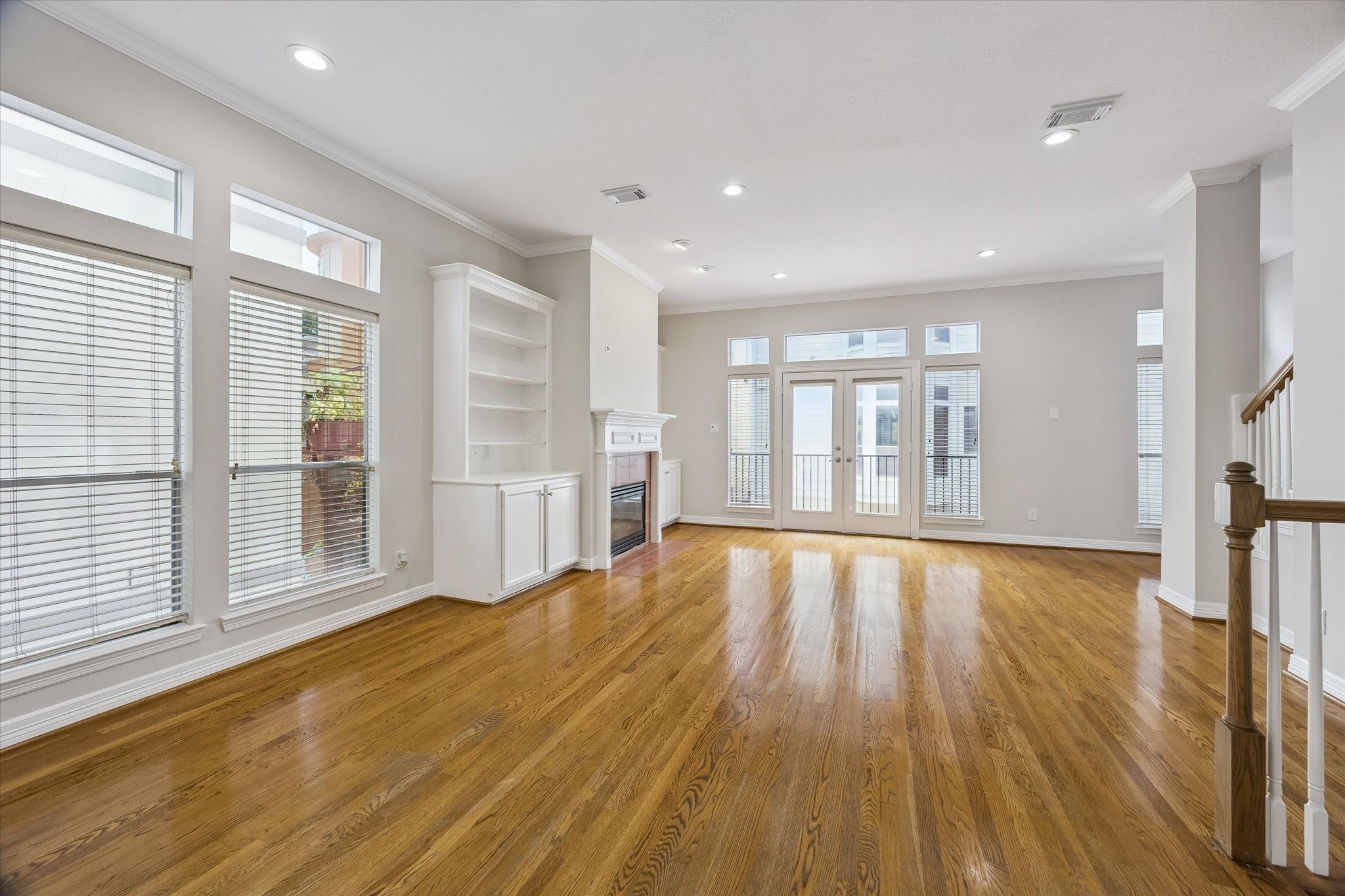 End-unit offers MAXIMUM natural light, pouring in from three sides! FRESH PAINT ON ALL INTERIOR SURFACES! Gleaming warm hardwood floors throughout 2nd floor!