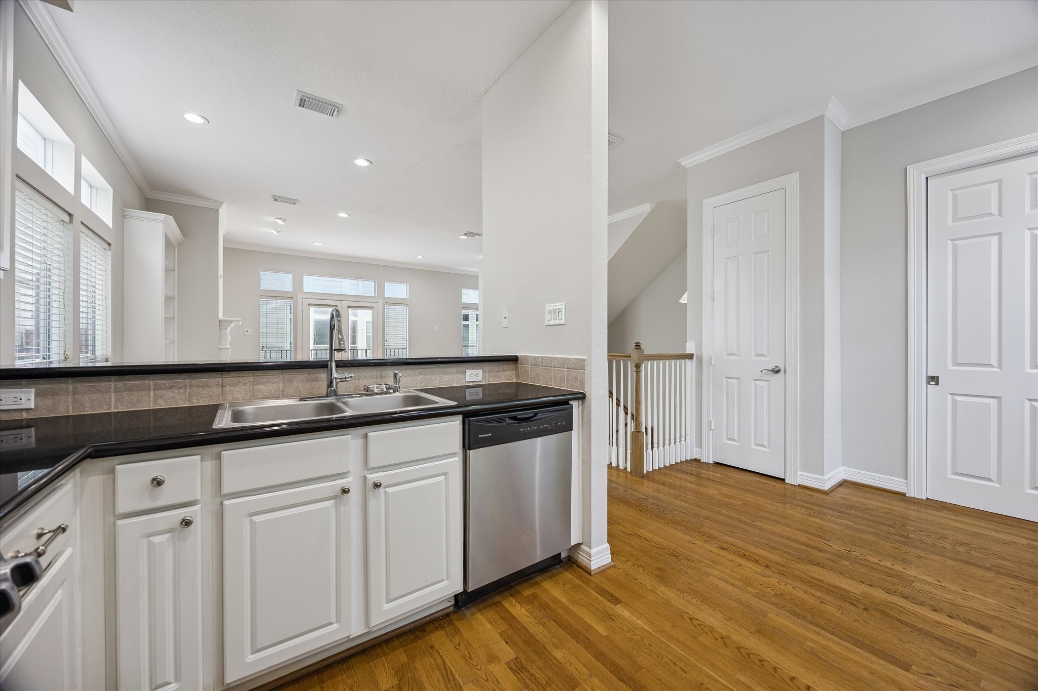Above sink is a "bar-top" that could double as more informal eating space or just a great spot to serve up those delicious meals!