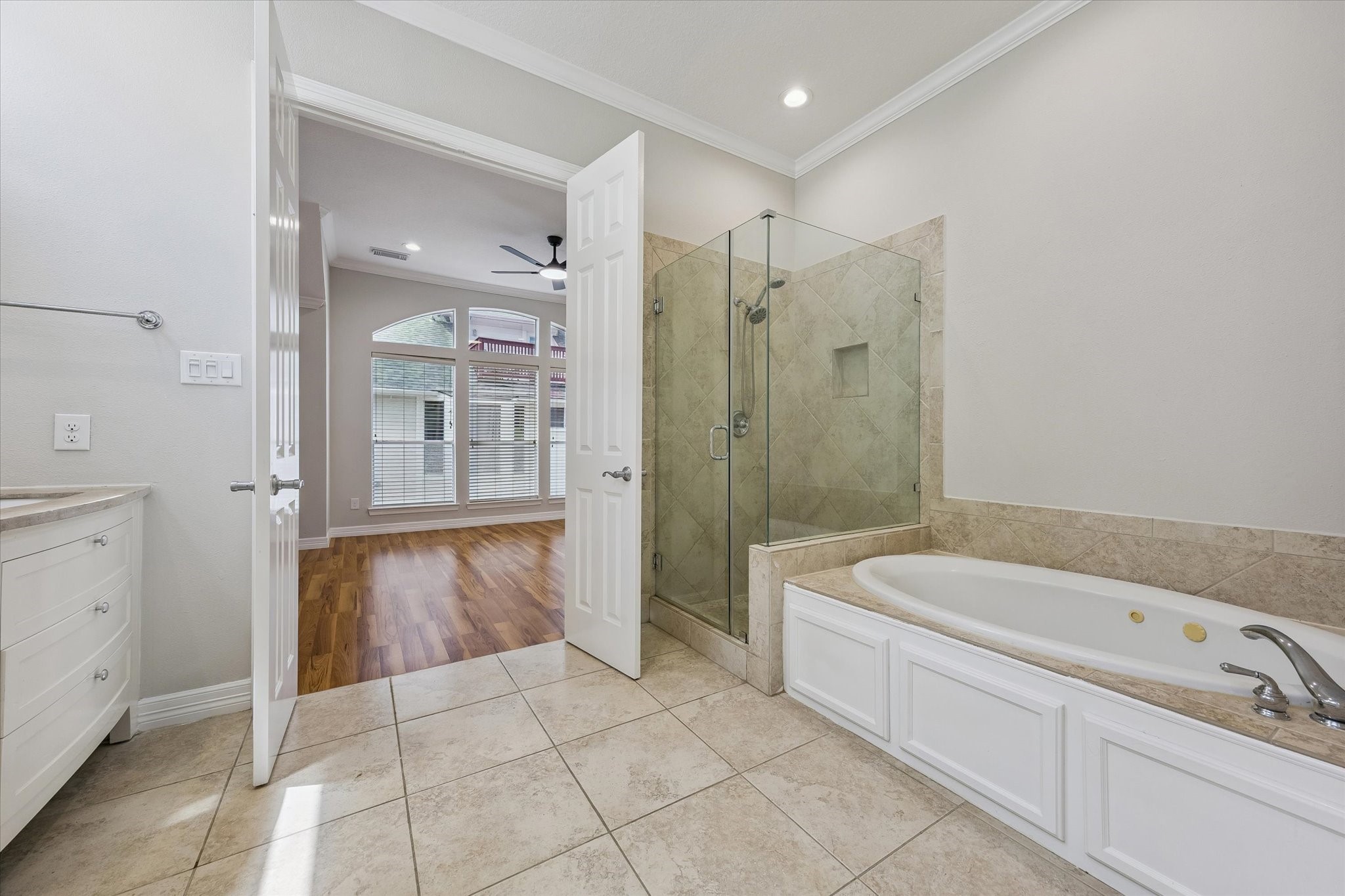 Separate glass shower and a HUGE soaking tub with jets! Champagne and bubbles anyone?
