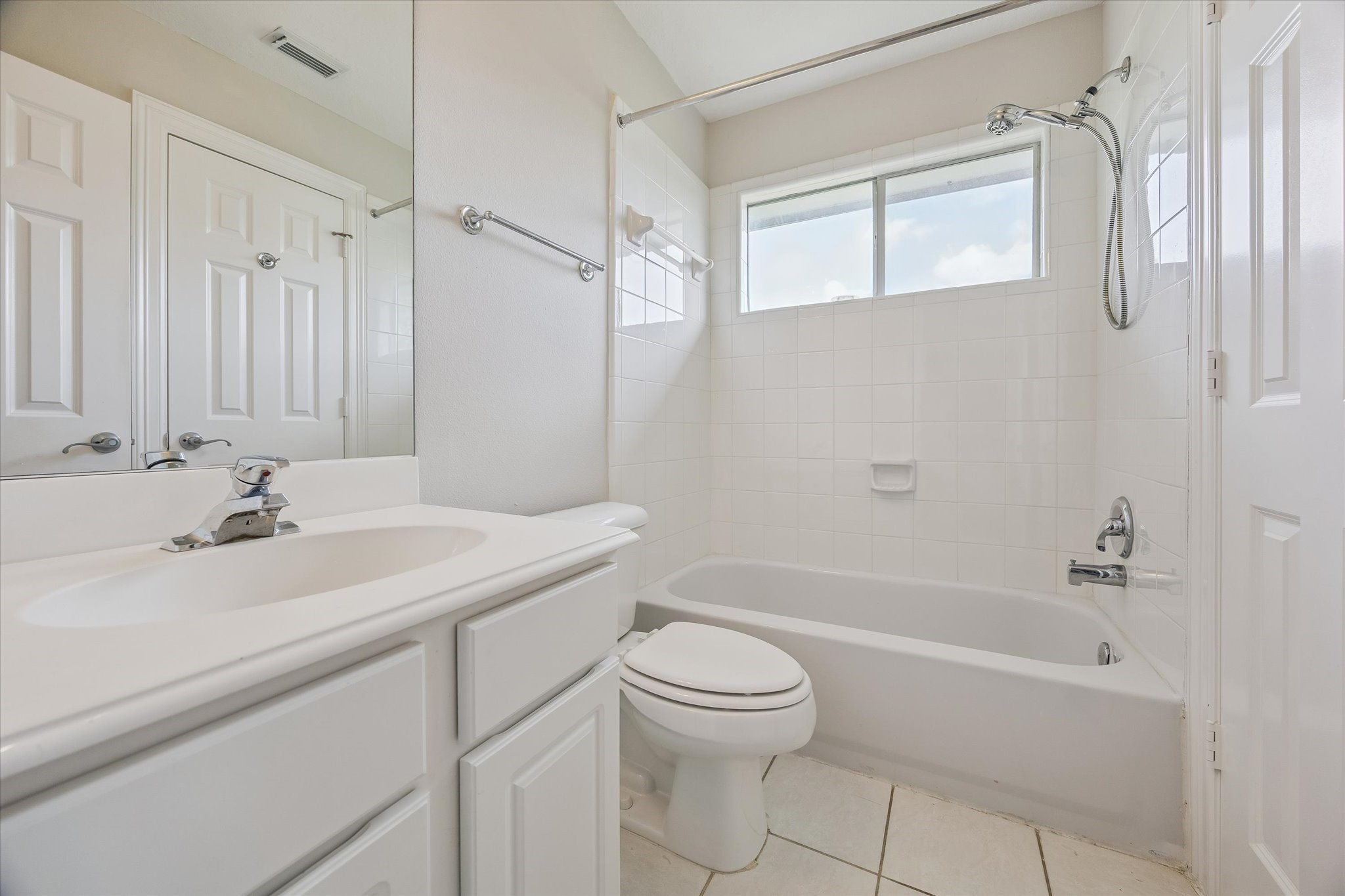 Cute & tidy! Tub and shower combo along with an adjoining clothing closet!