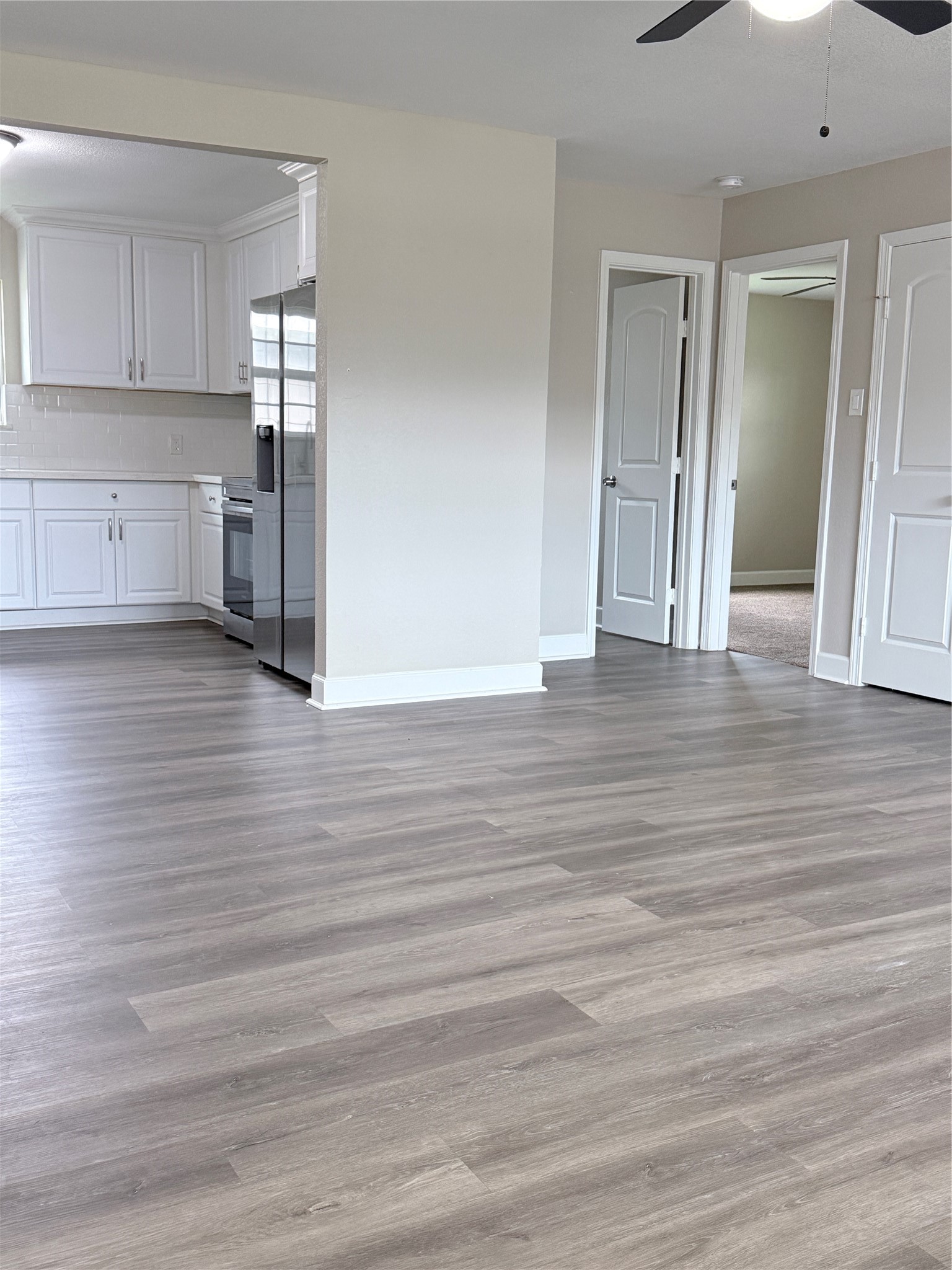 Enjoy a spacious and inviting atmosphere with a seamless flow from the living room to the kitchen. Enjoy a spacious and inviting atmosphere with a seamless flow from the living room to the kitchen.