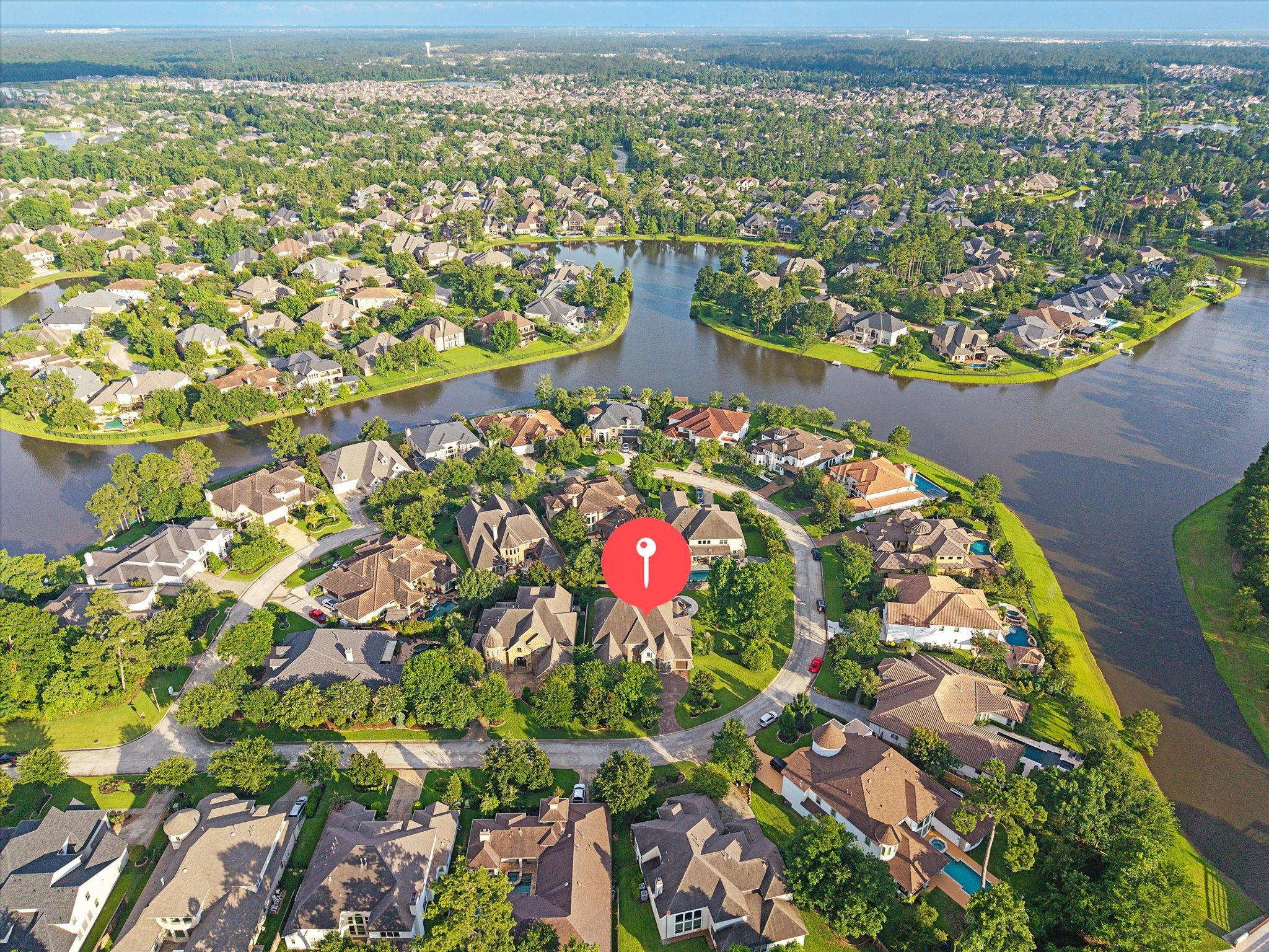 Ideally positioned on a corner lot, 35 N Fremont Ridge Loop enjoys a picturesque setting surrounded by scenic lakes, mature trees, and the natural beauty that defines the Creekside Park lifestyle.