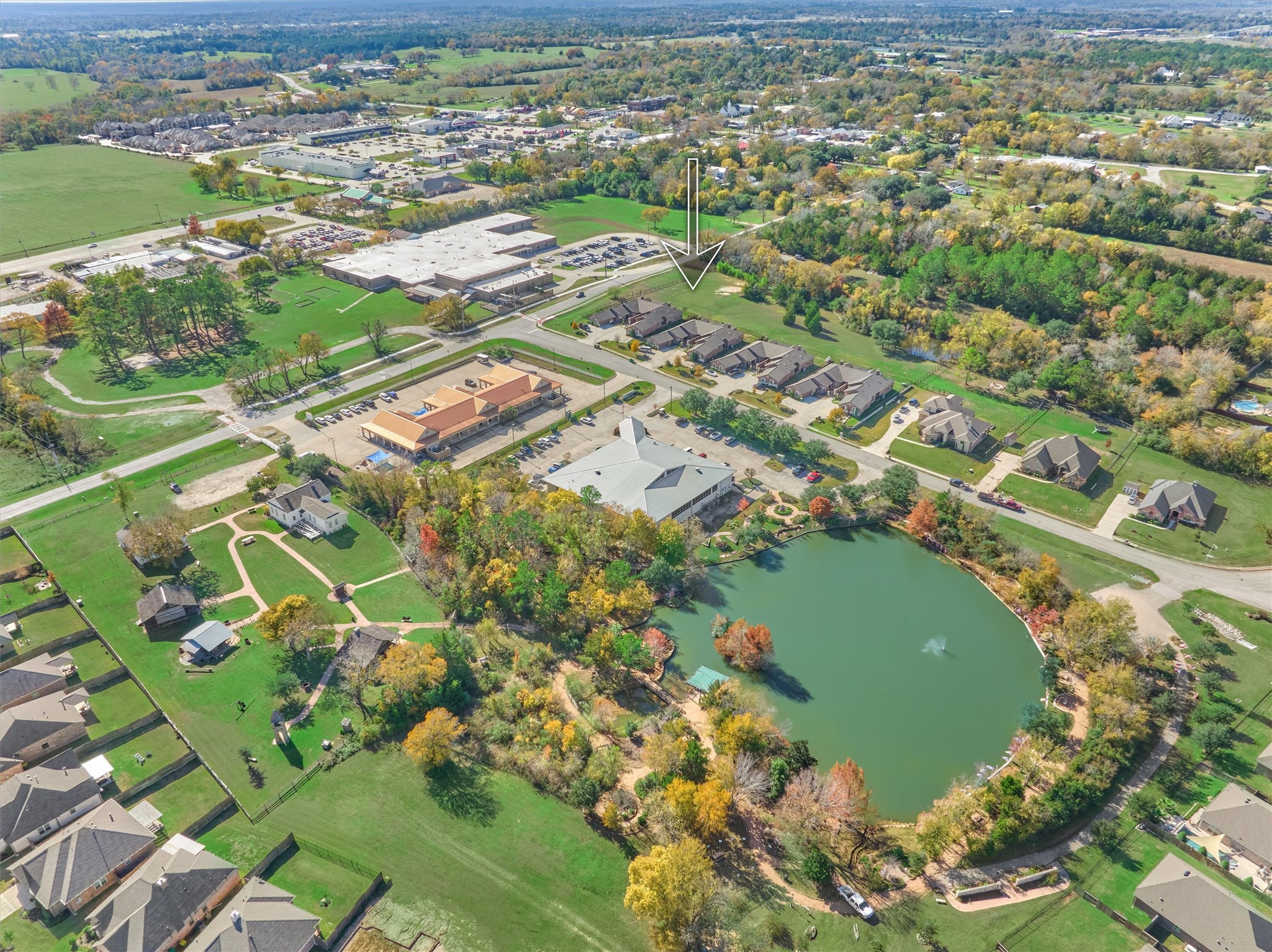 Directly across this serene street is Memory Park with a pond and walking trails.