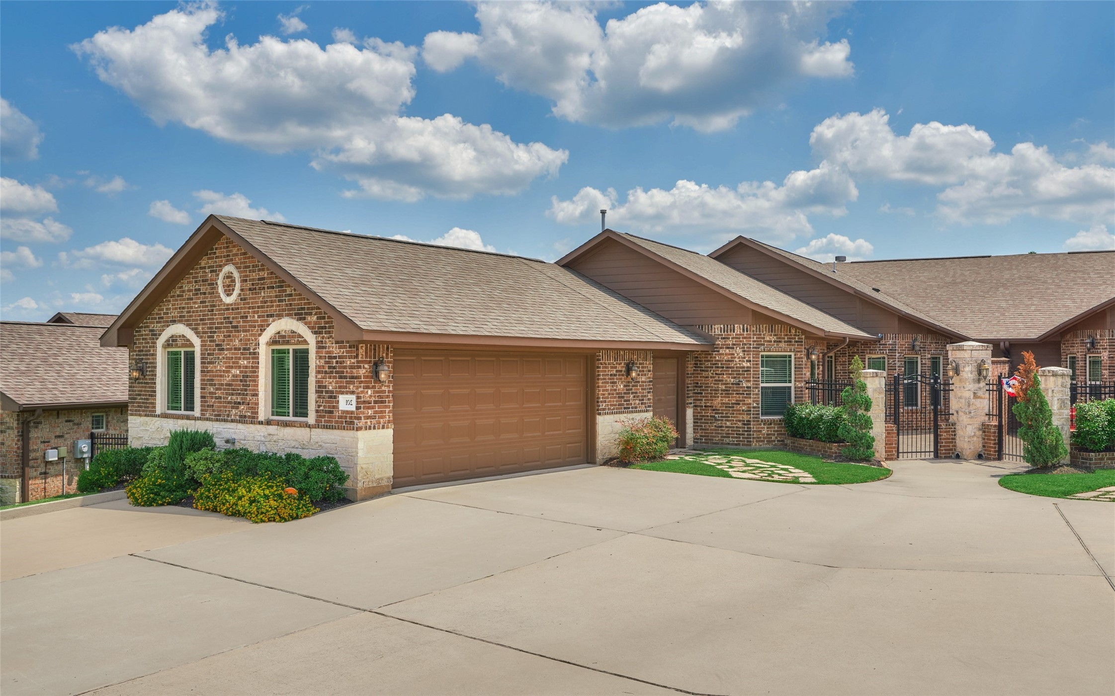 Oversized 2-car garage with golf cart garage and additional parking. Oversized 2-car garage with golf cart garage and additional parking.
