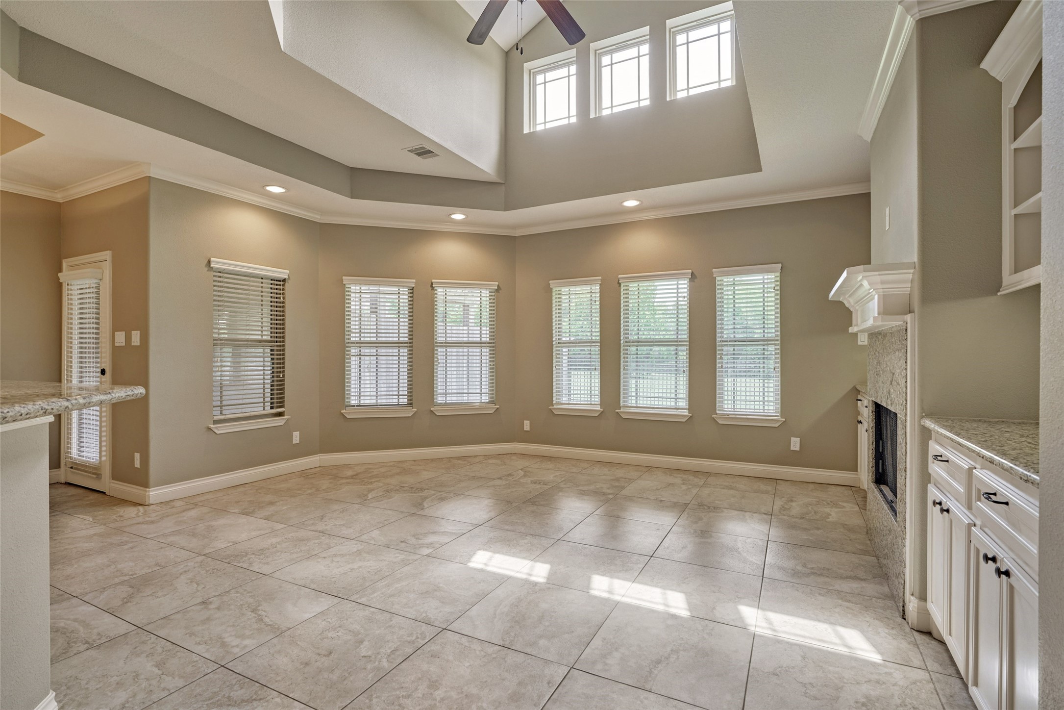 Vaulted ceilings in the family room. This space could easily become the heart of your new home.