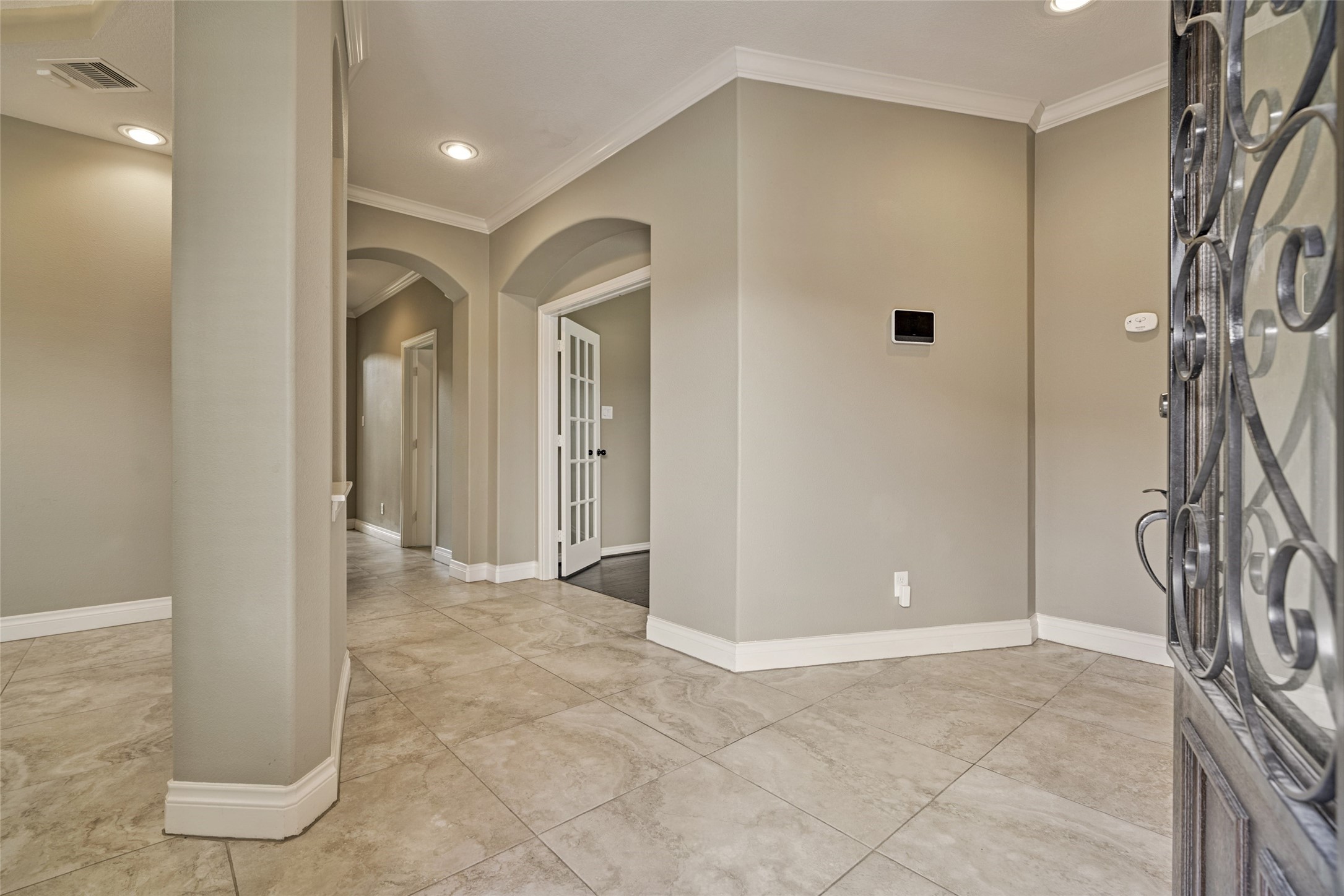 This immaculate townhome features a neutral color palate with tile and hand scraped hardwood flooring. This immaculate townhome features a neutral color palate with tile and hand scraped hardwood flooring.