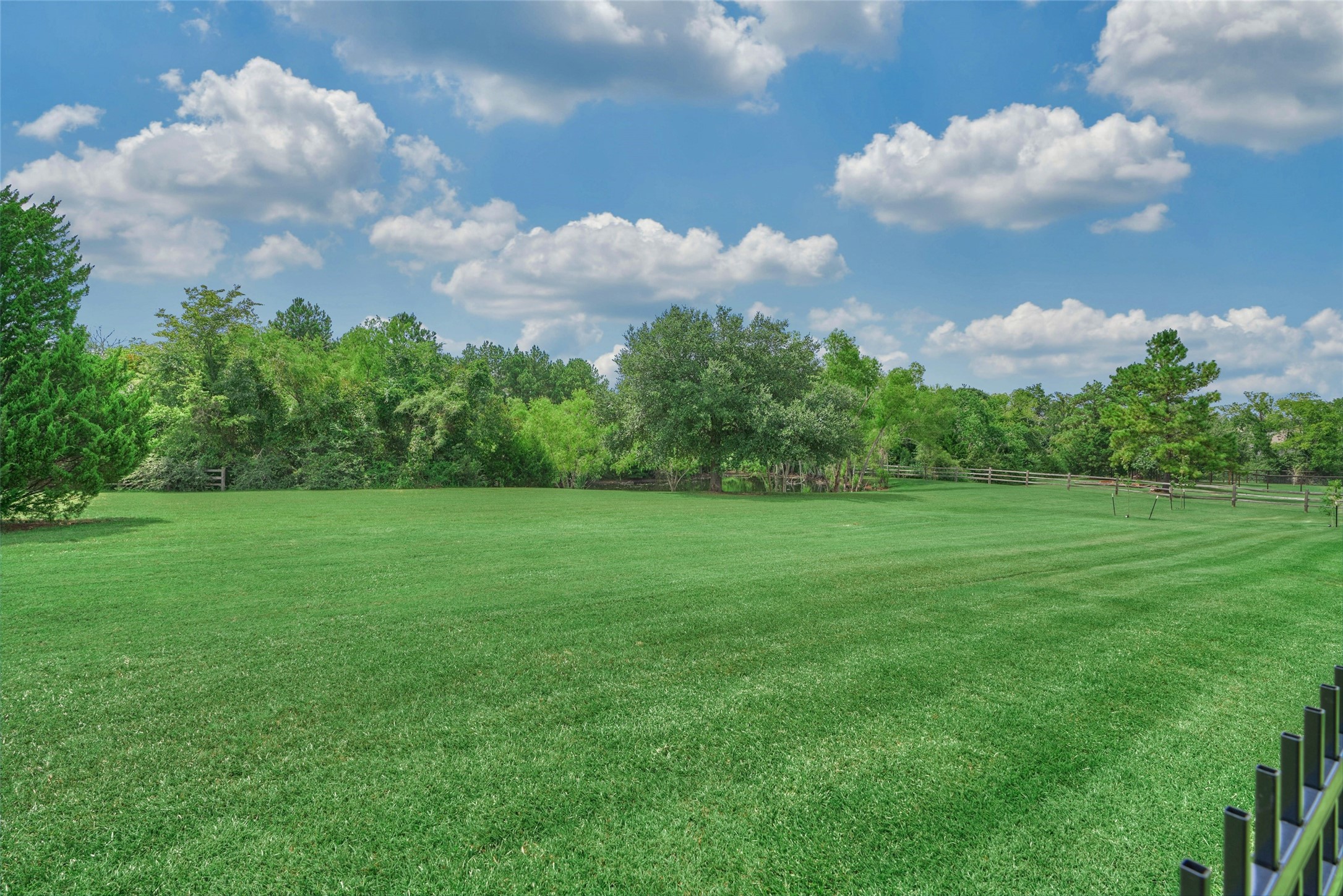 No back neighbors offering ultimate privacy! Home sits on a beautiful lot backing to a greenbelt and mature trees.