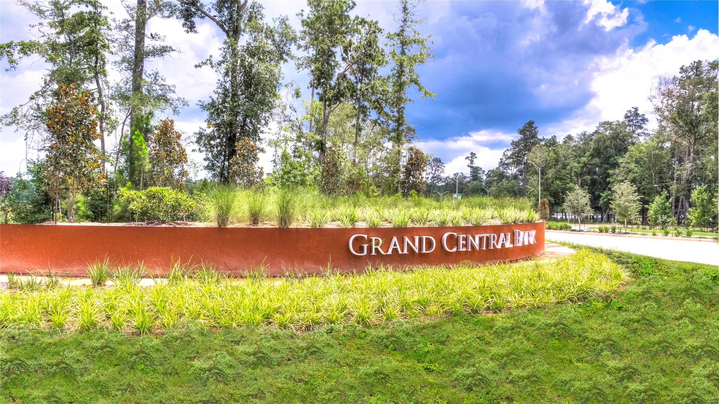 Grand Central Park is a wonderland of lush, forested beauty. In fact, a significant portion of the entire community is woods and pristine lakes.