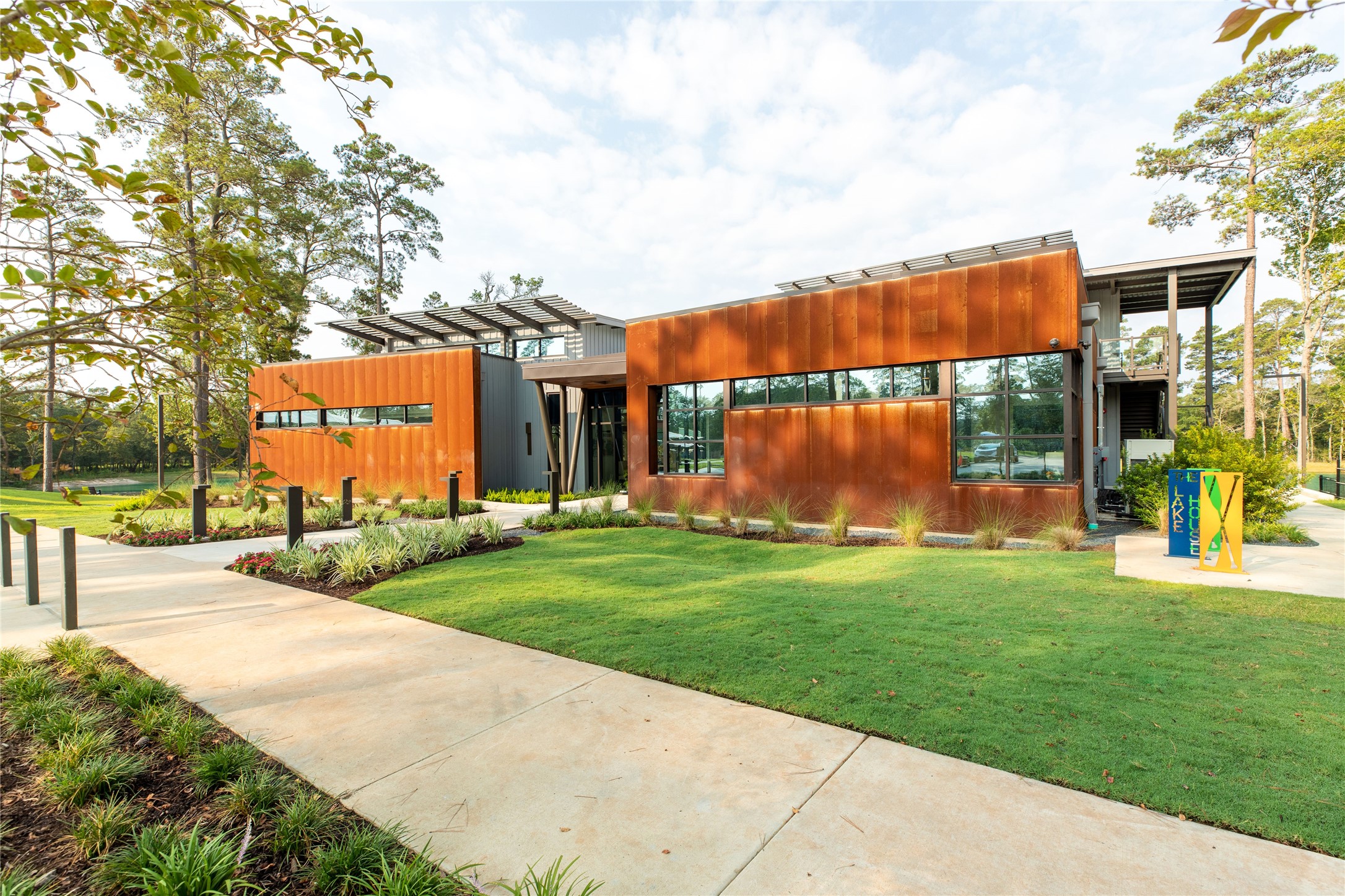 The Lake House has a fitness room, resort-style pool, event lawn, huge covered pavilion, patio with lake views and an indoor air-conditioned Grand Room.