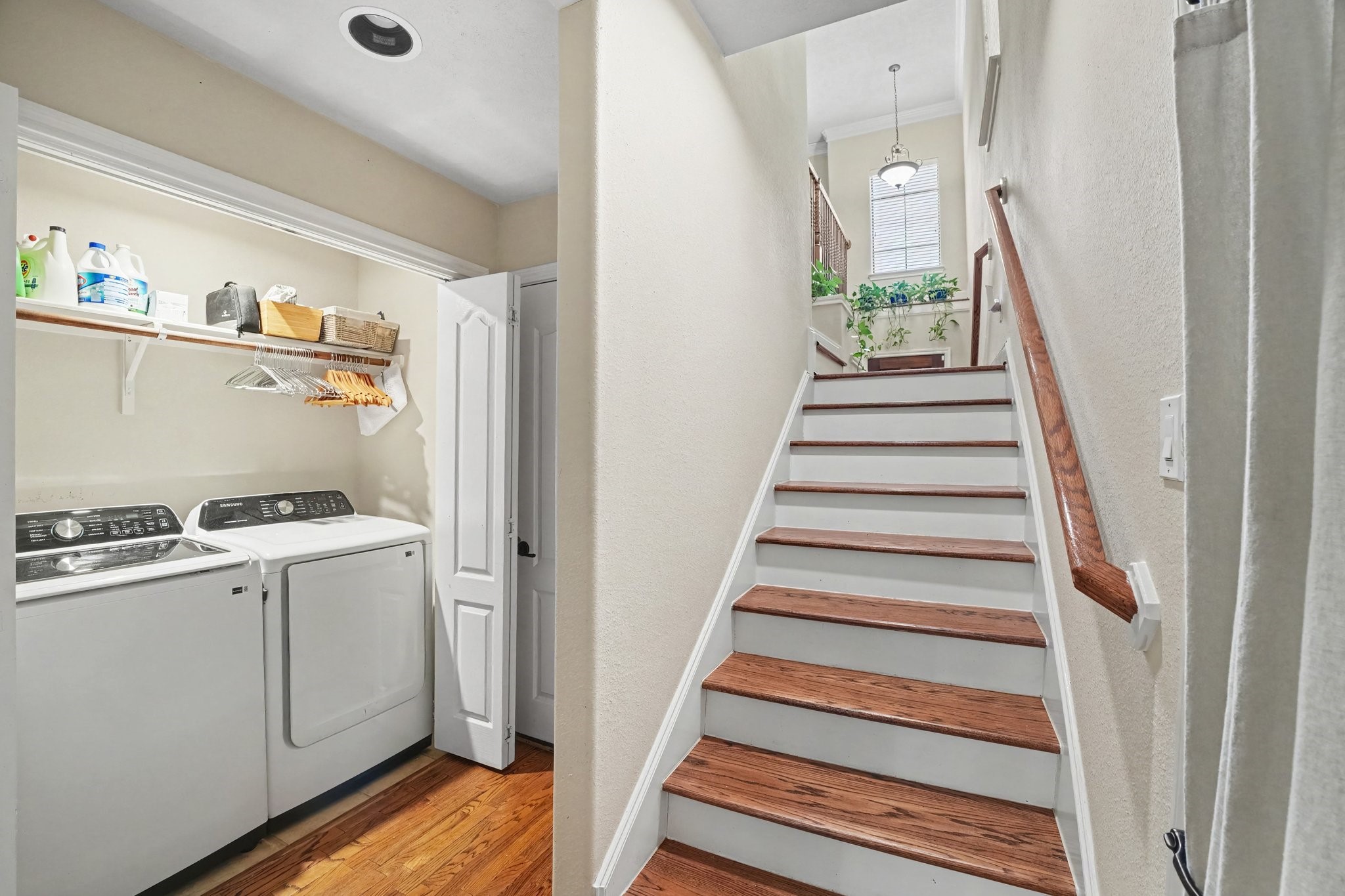 Laundry area with recent w/d is down here also. Door to garage. Door on right leads to outside patio area