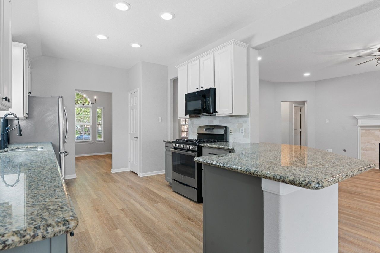 Enjoy the convenience of direct access to the formal dining room, making it easy to serve family dinners and entertain guests. The spacious walk-in pantry provides abundant storage to keep your kitchen organized and everything within easy reach.