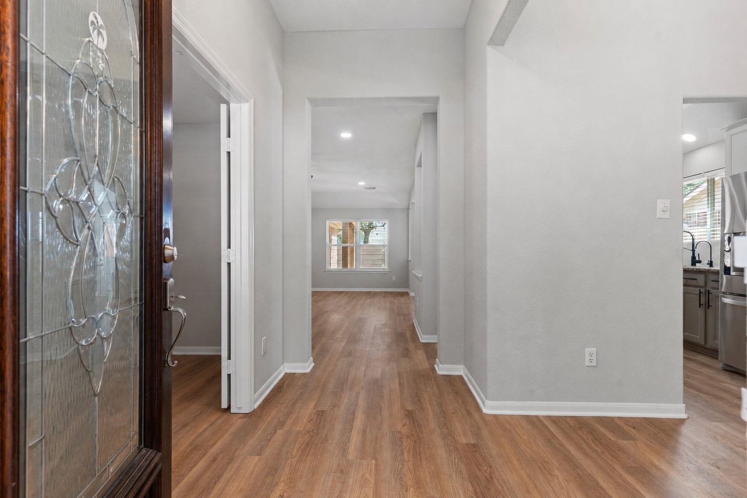 Open the door and smell the Fresh Paint and the New stunning Updated Flooring throughout this stunning home!