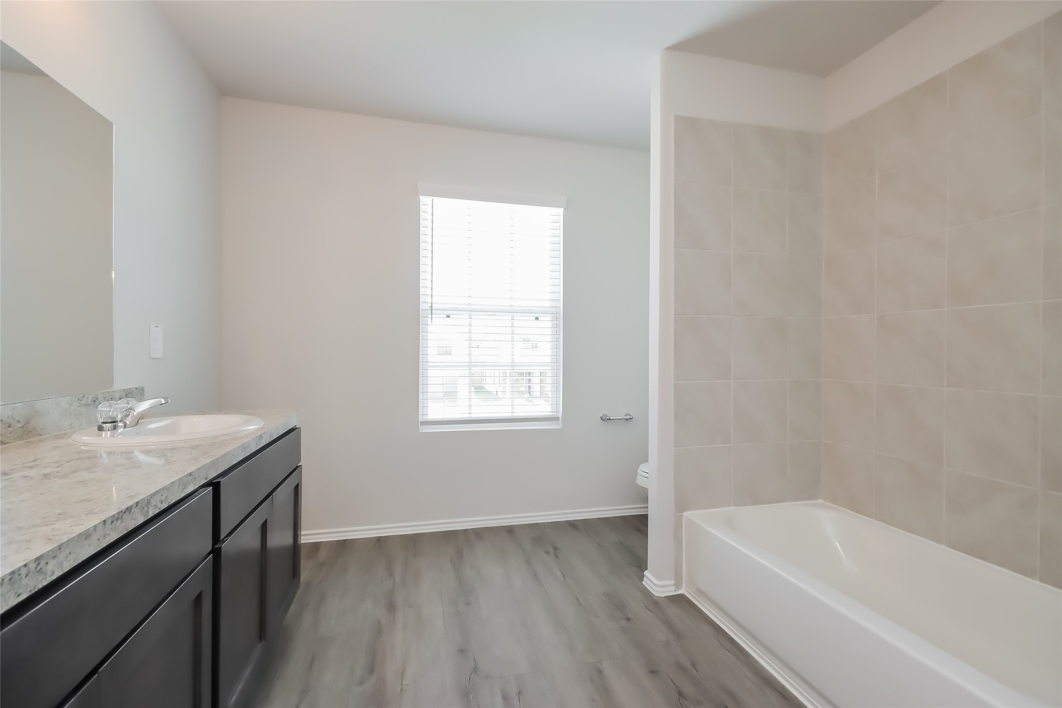 Photos may be representative of the floor plan and not the exact home. Finishes, layout, and features of the actual property for lease may vary.