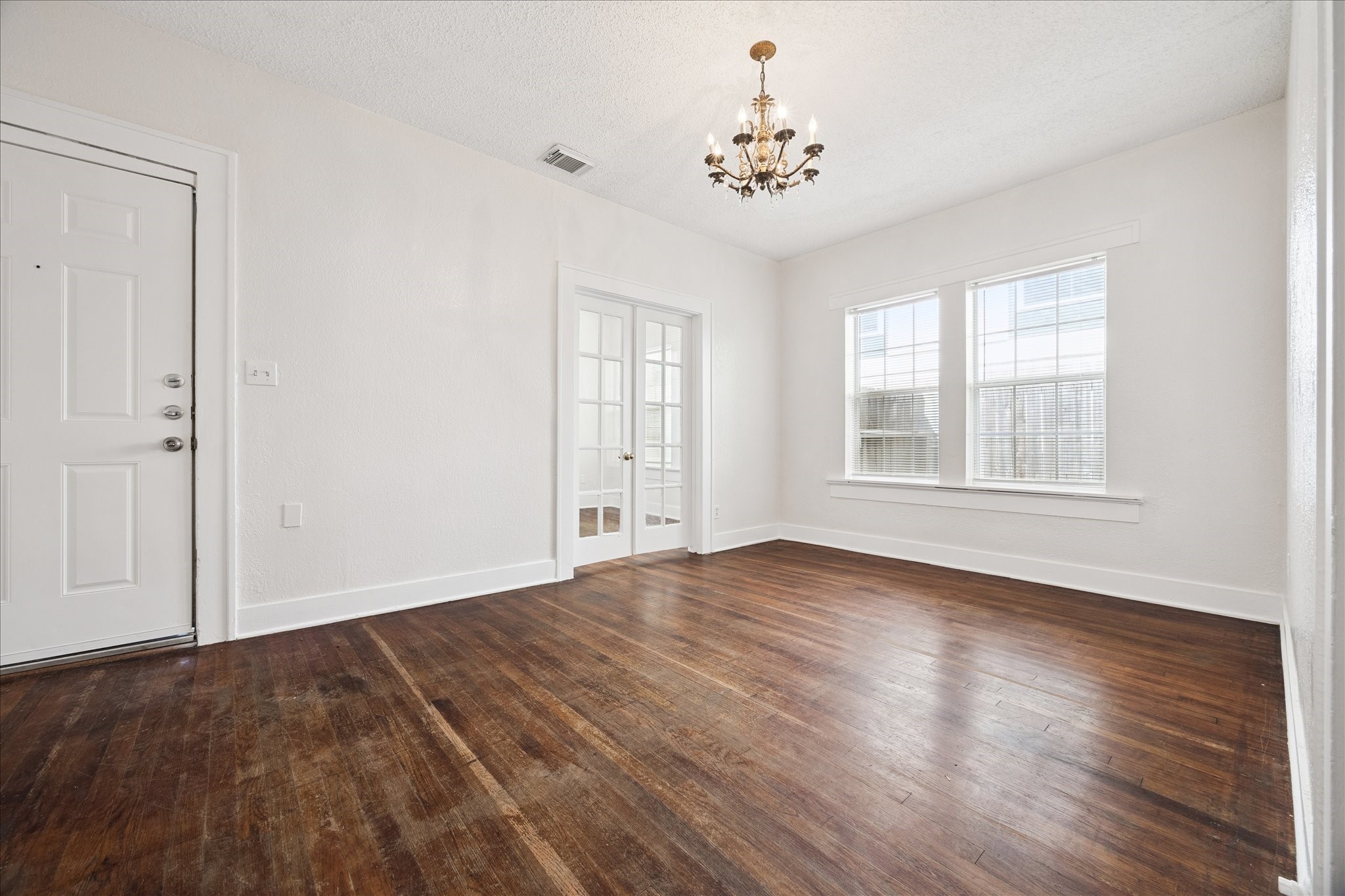 Light and bright living room as you enter the home.