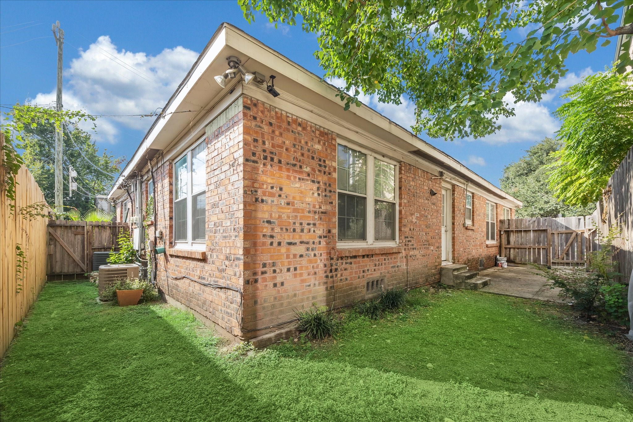 Corner view of backyard - rare to have such a large yard in Montrose!