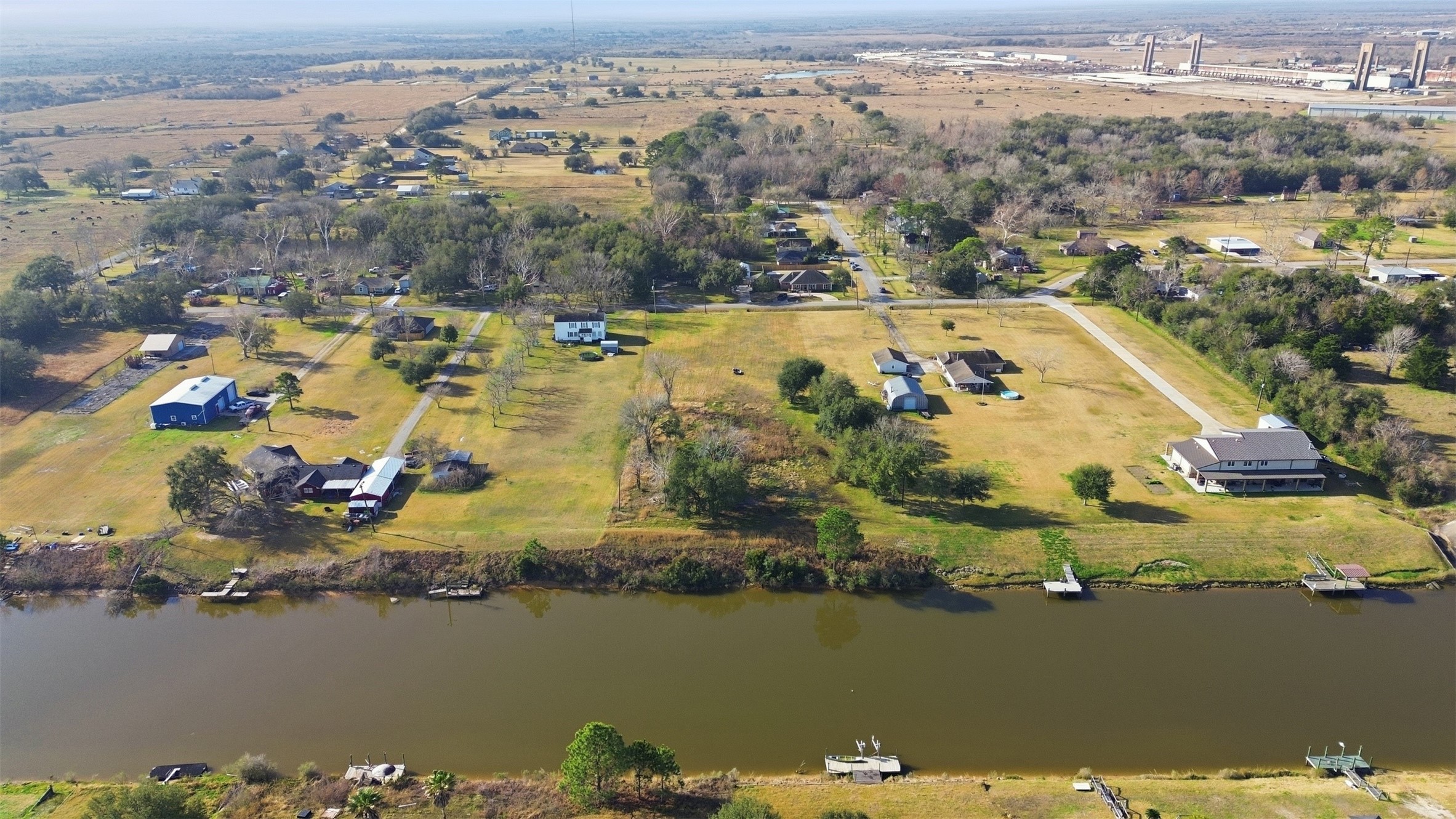 another overhead view of mature oaks on the acreage