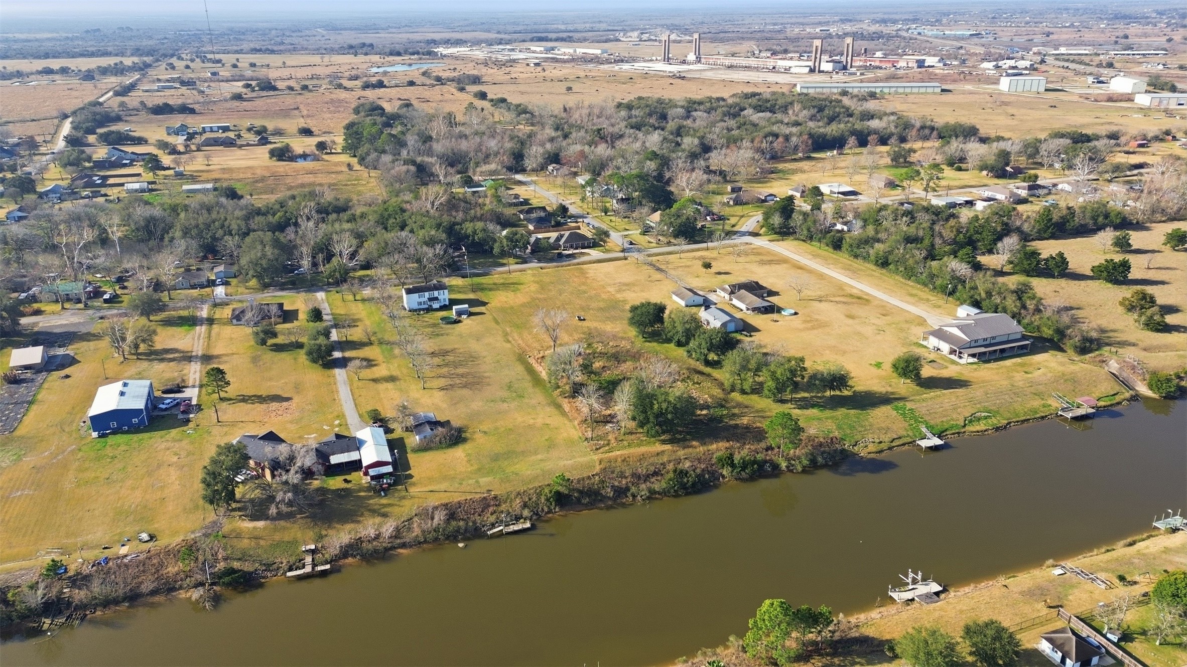 Wide canal is ready for fishing, kayaking, or peaceful sunset views