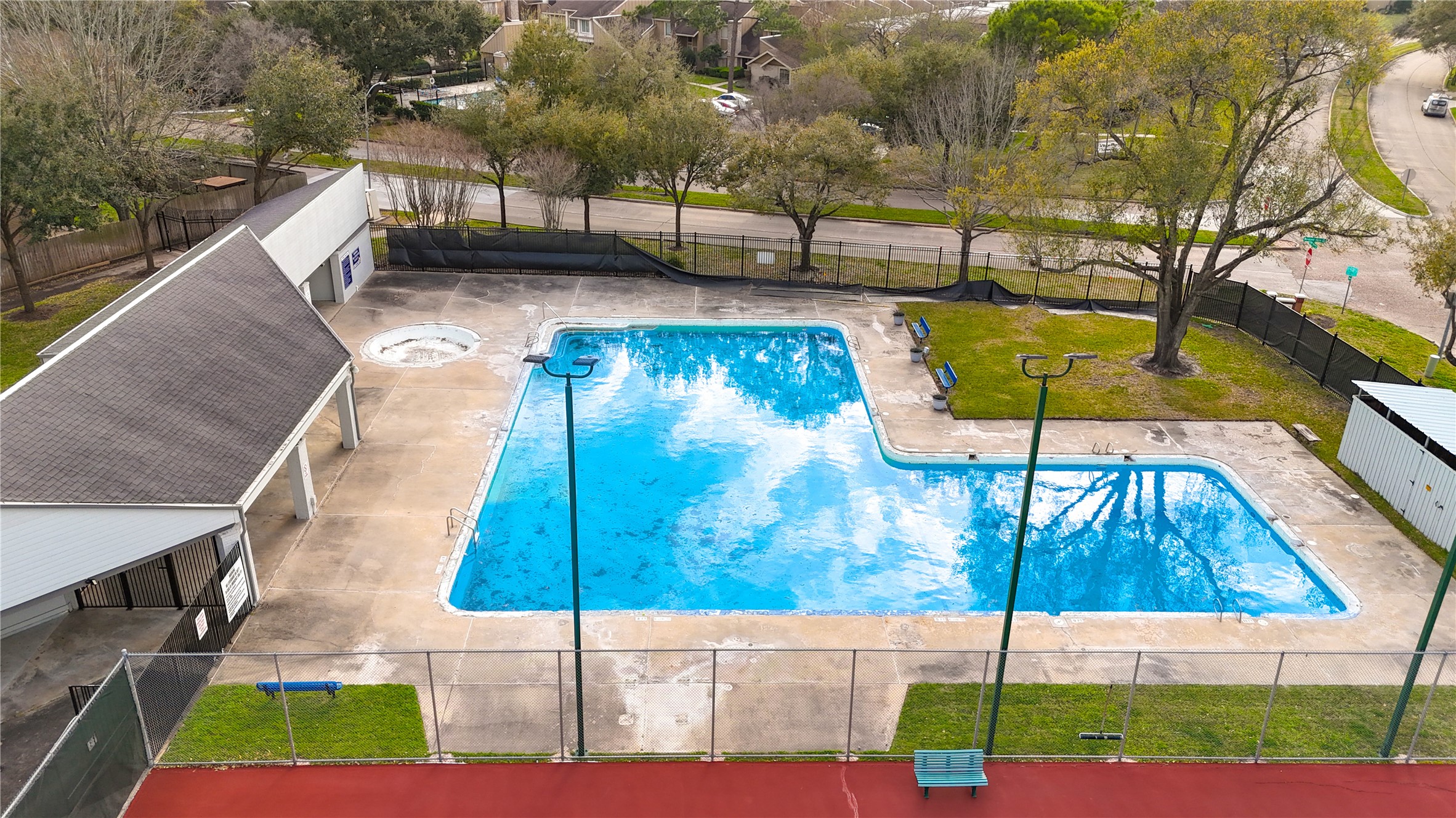 Dive into the Village West lifestyle! The neighborhood community pool offers a refreshing escape on warm Houston days, whether you're enjoying a leisurely afternoon poolside, cooling off with a swim or gathering with neighbors. Surrounded by mature trees and inviting outdoor spaces, this wonderful community amenity adds another reason to love calling Village West home in the heart of the Energy Corridor!