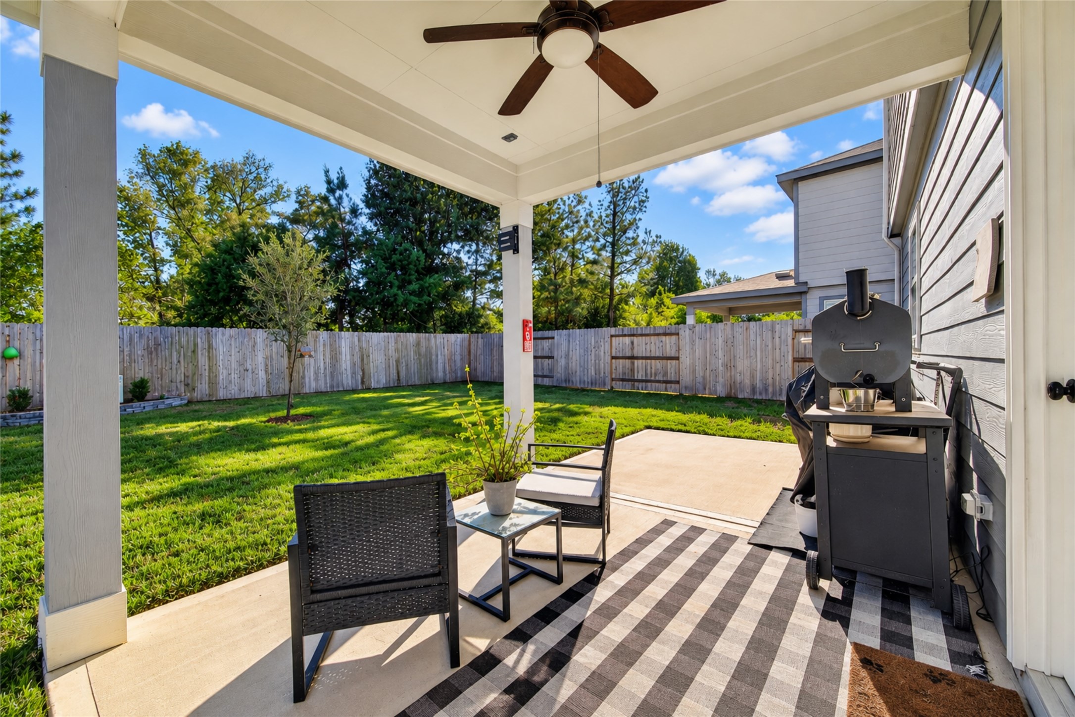 Imagine enjoying your morning coffee or relaxing after a long day beneath this extended covered patio. With room for outdoor seating and grilling, this inviting space is ready for relaxing evenings and weekend entertaining.