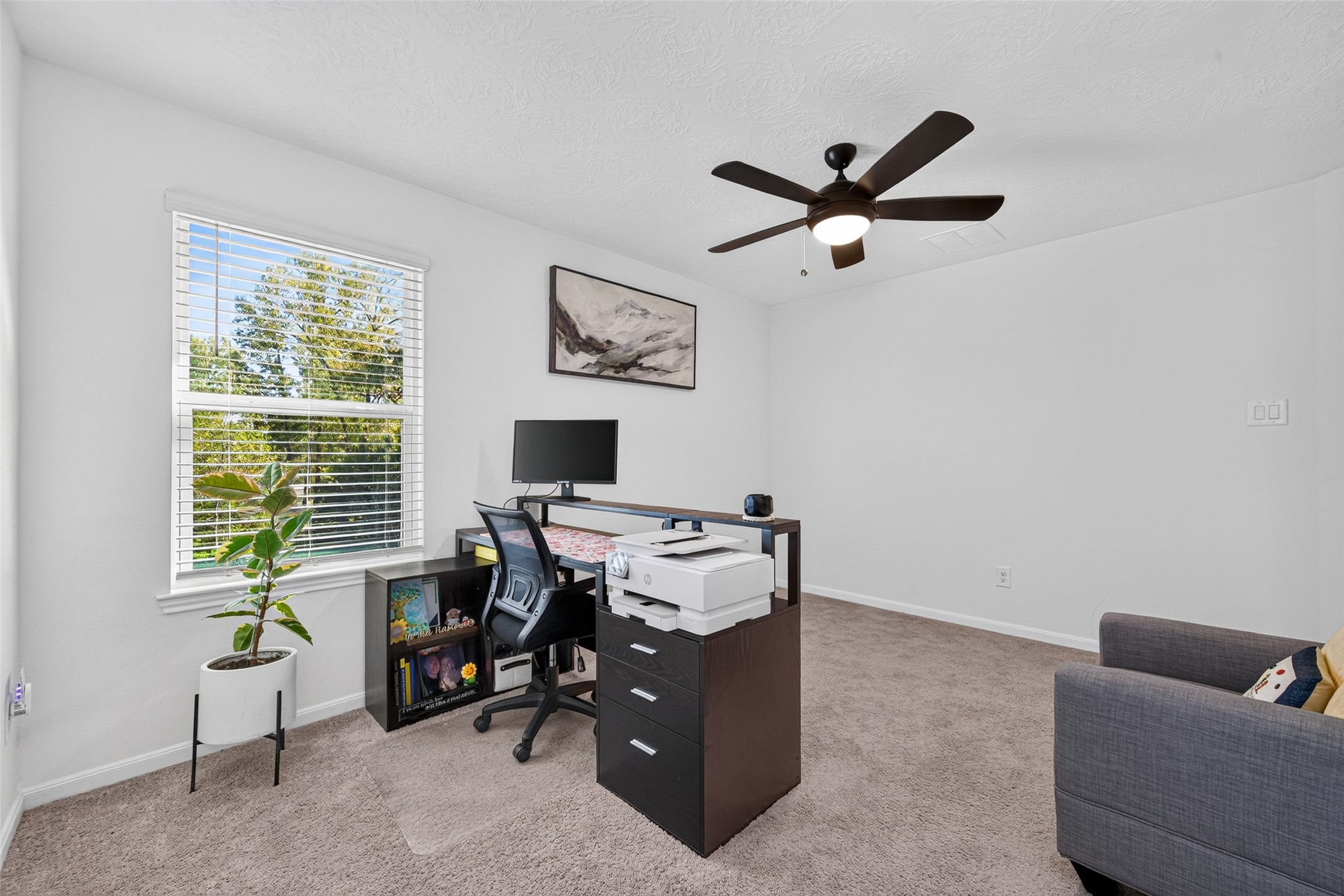 This generously sized secondary bedroom offers plenty of flexibility to accommodate a variety of furniture arrangements. With its functional layout and inviting atmosphere, the space can easily be personalized to complement your lifestyle and needs.