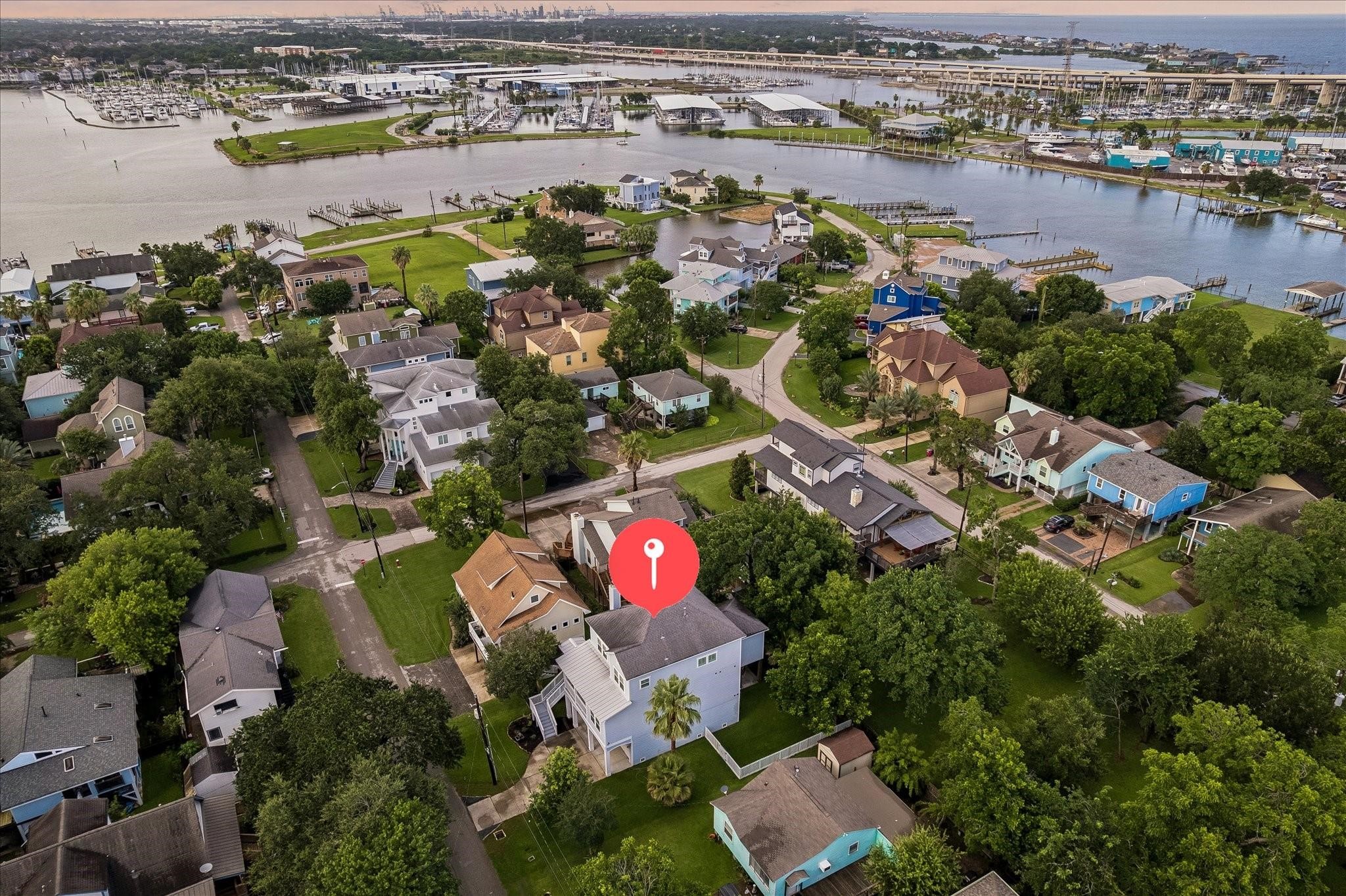 Aerial view showcasing the homes proximity to Clear Lake and the Kemah Channel Aerial view showcasing the homes proximity to Clear Lake and the Kemah Channel