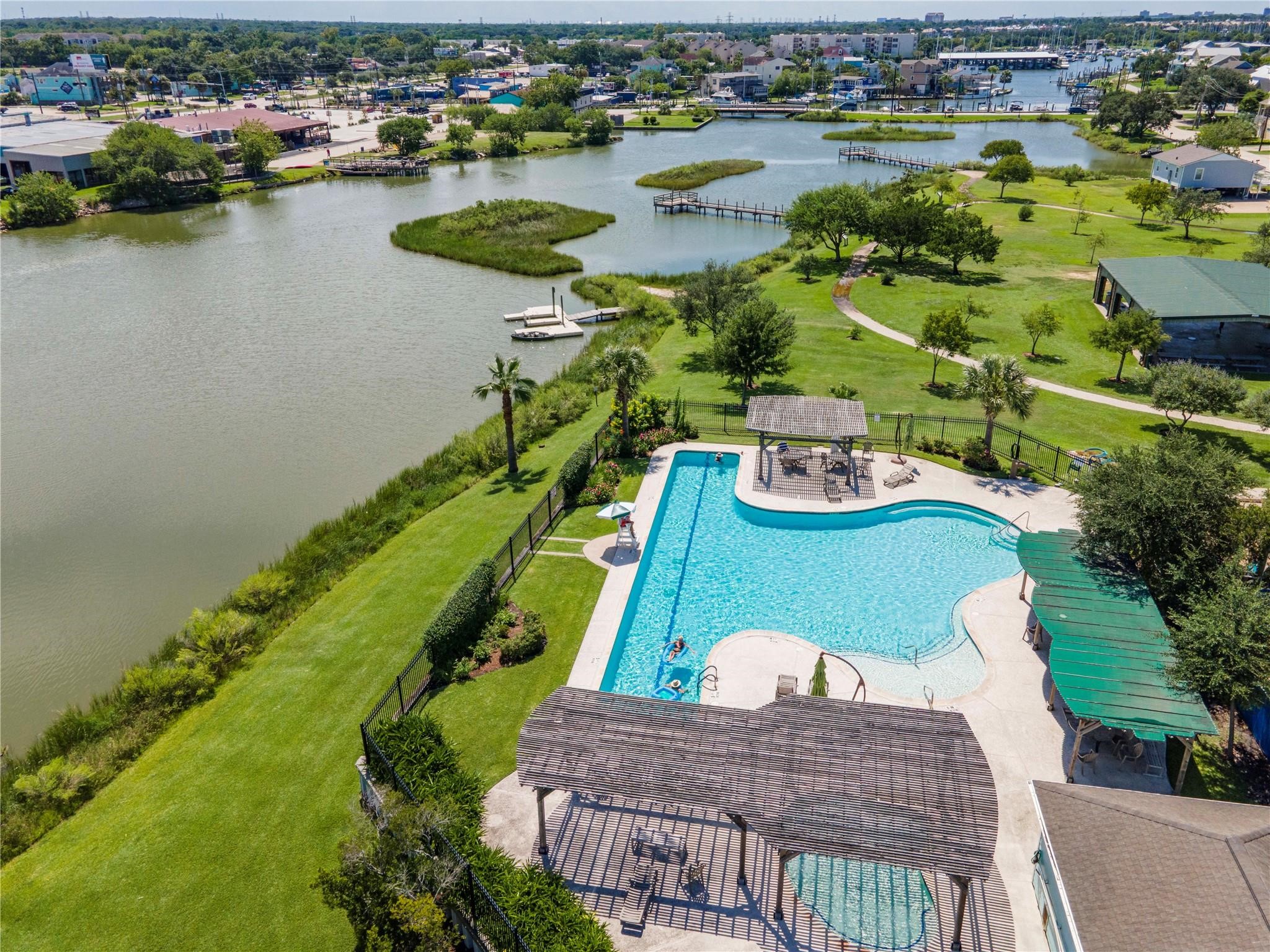 Community pool, pavilion, and nature park all with waterfront views
