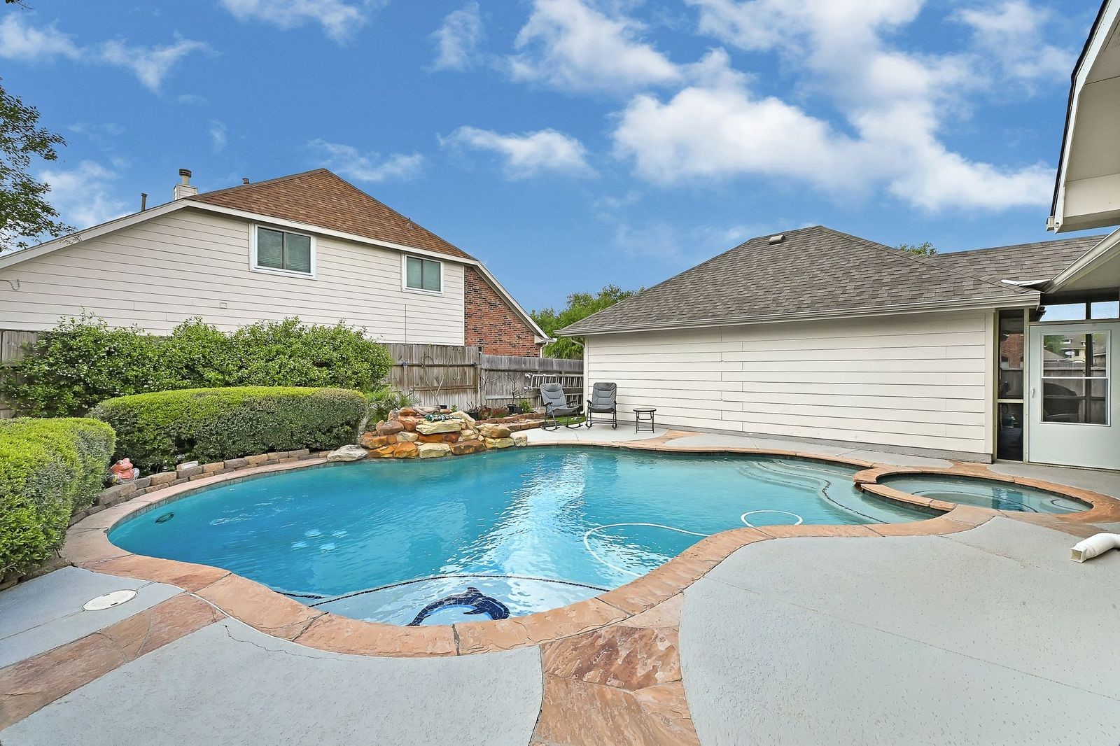 Gorgeous swimming pool with waterfall