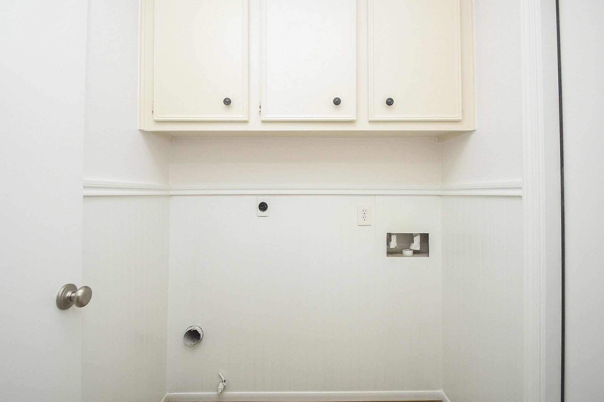 Laundry room is located in the house.