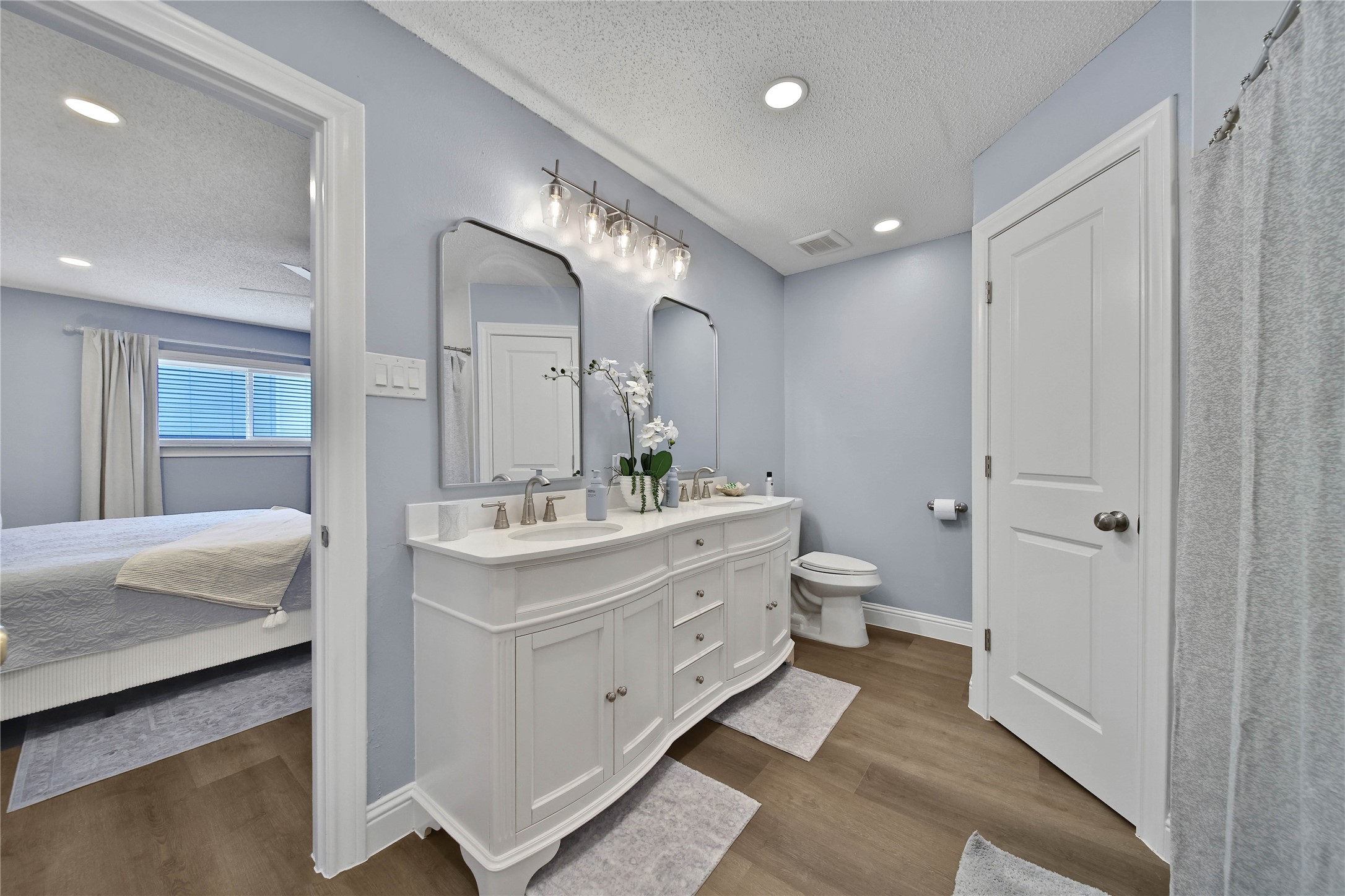 Master ensuite with double vanity and 2 walk in closets.