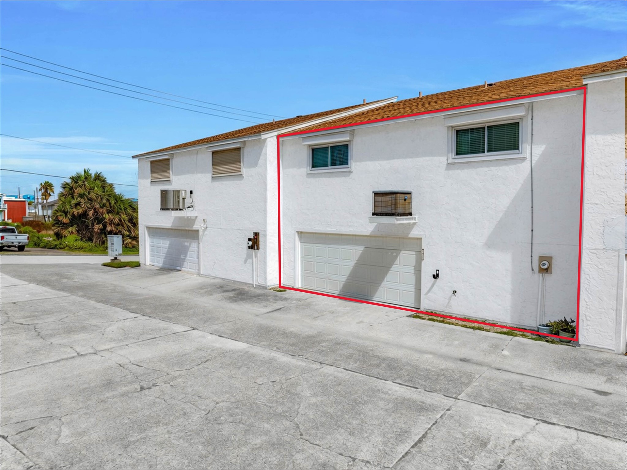 Automatic entry with a new garage door and opener.