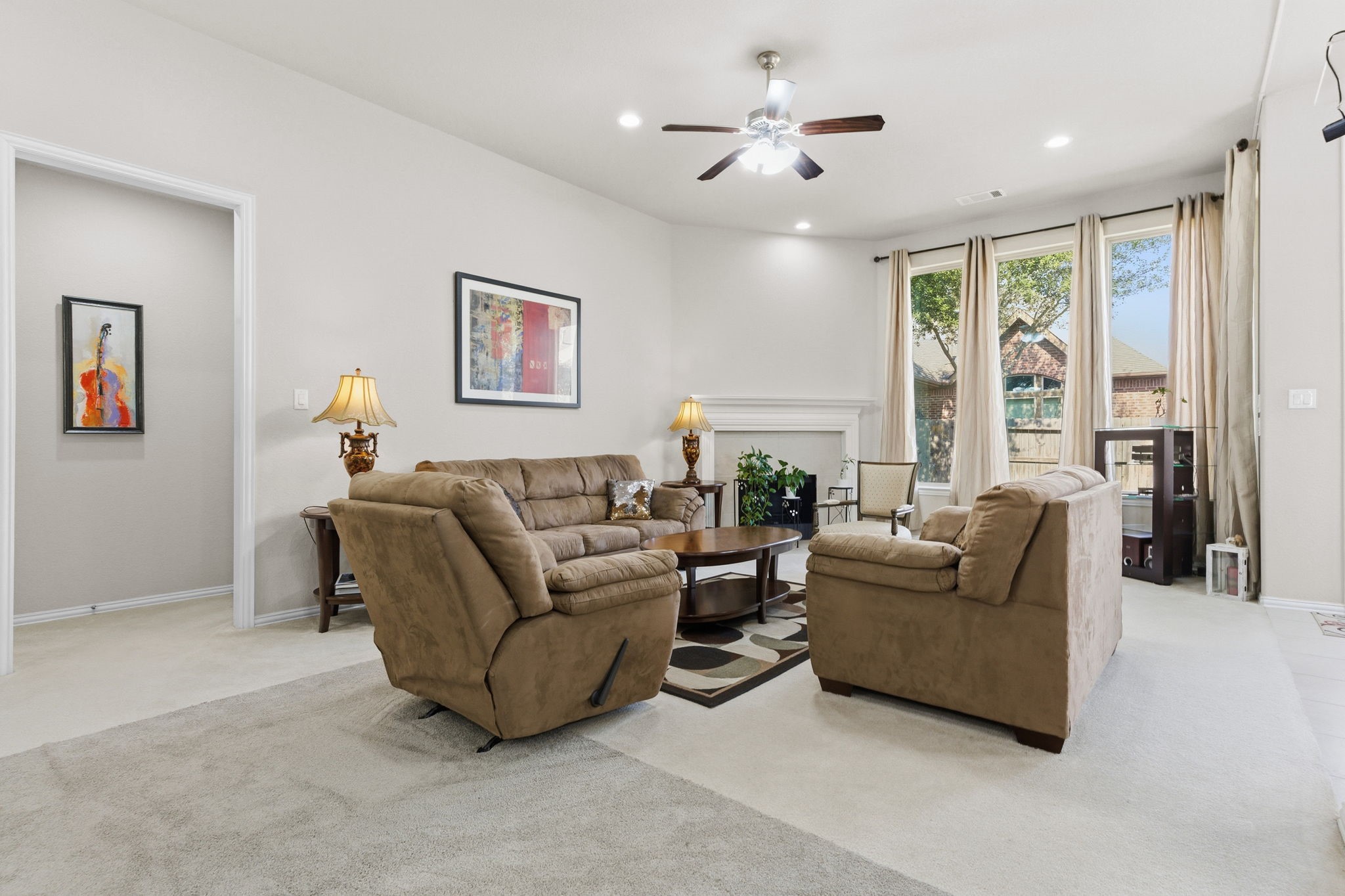 View from the kitchen island into your common area ready for movie nights with the family