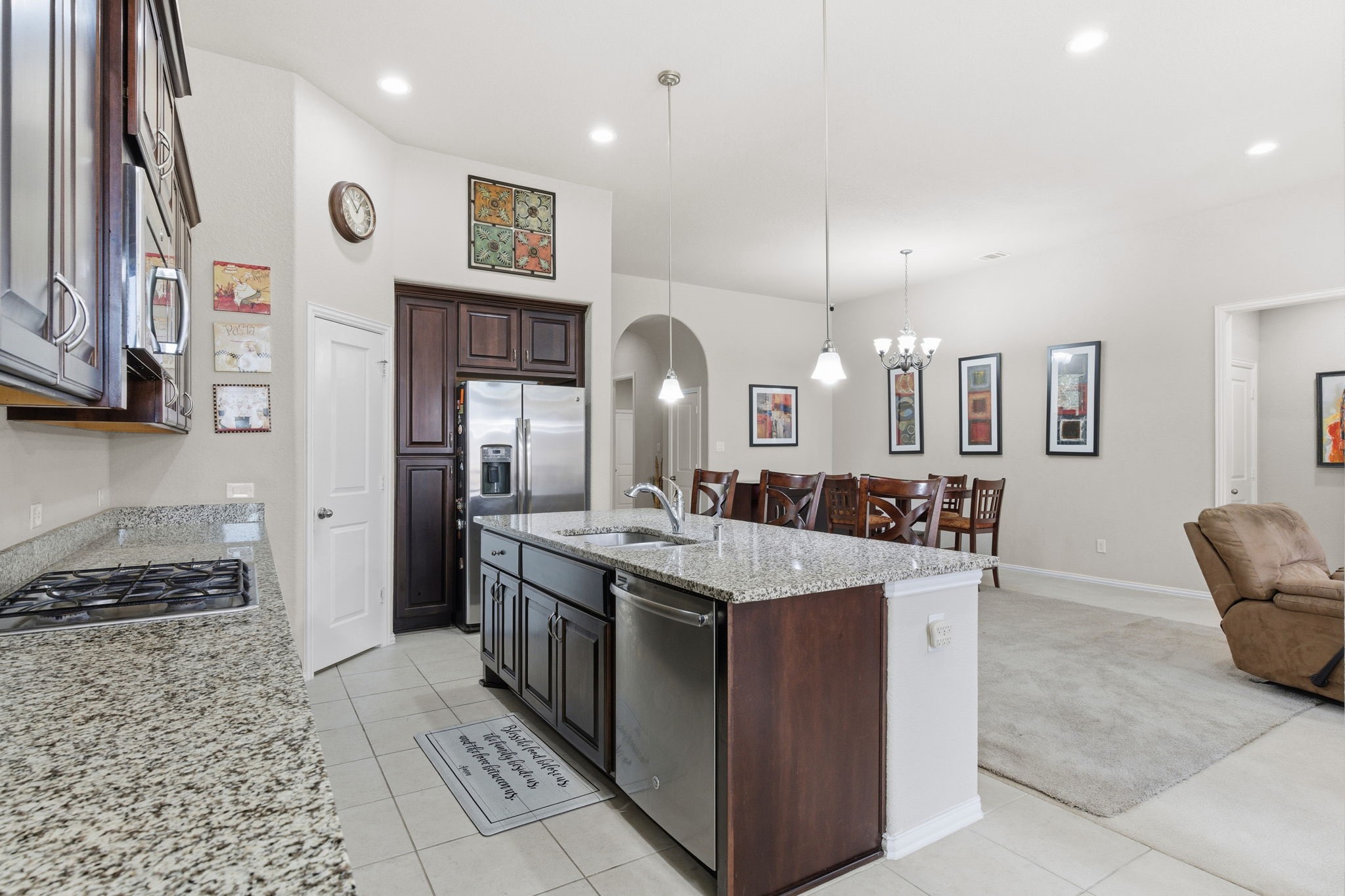 Beautiful kitchen features granite counter tops and massive kitchen island perfect for family gatherings!