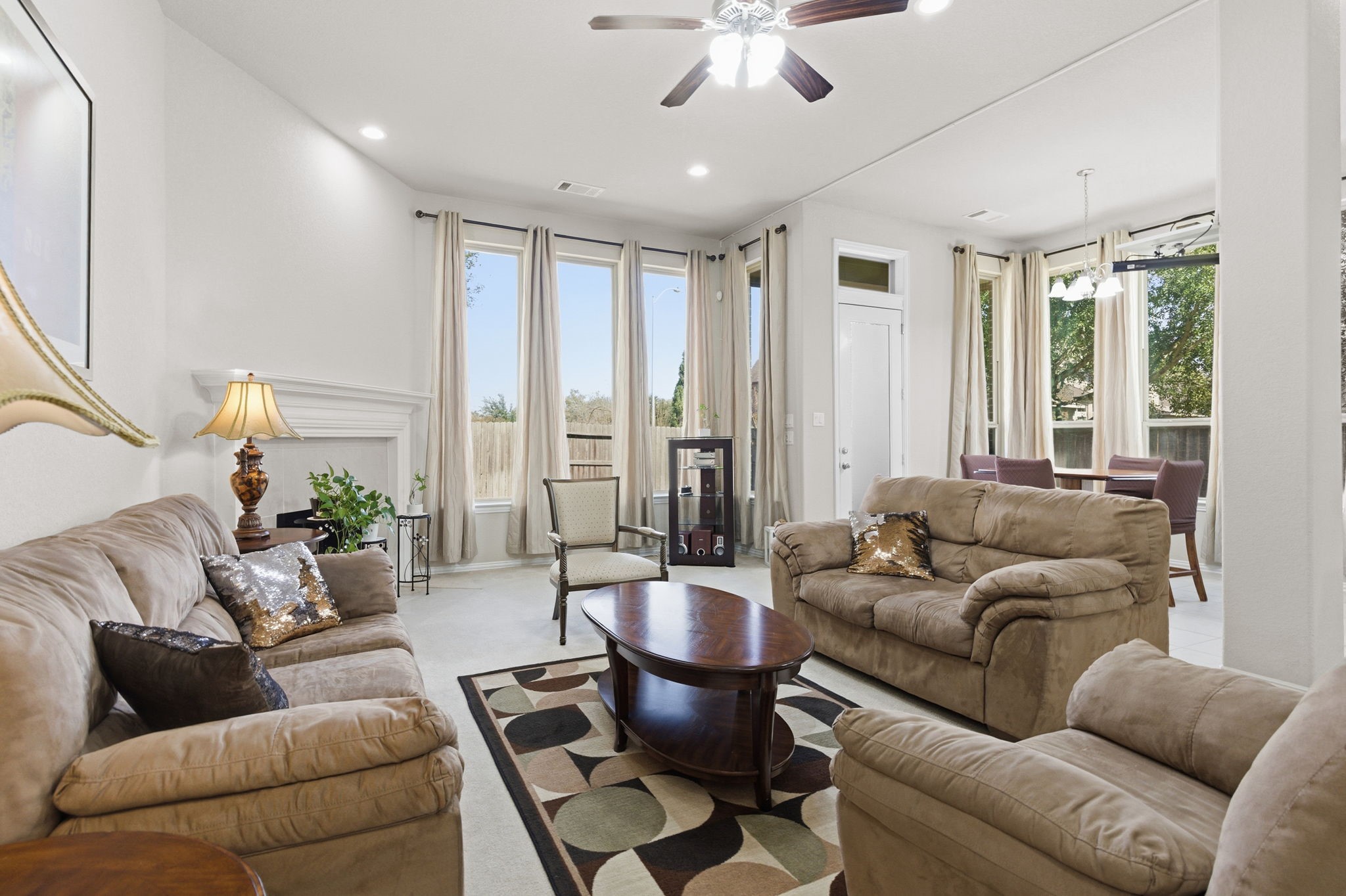 Open concept surrounded by large windows bring in beautiful natural light.