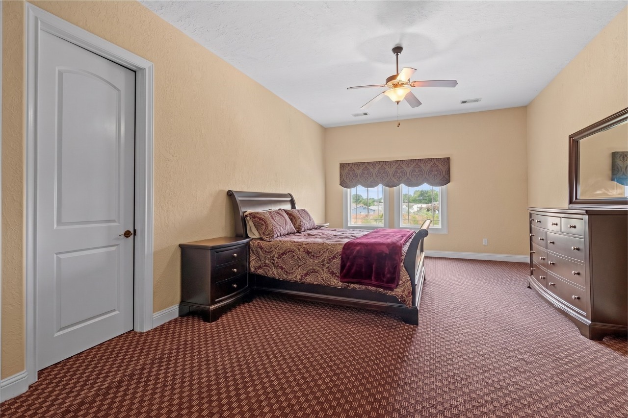 Fifth Bedroom has an ample natural light, and generous space for additional furnishings.