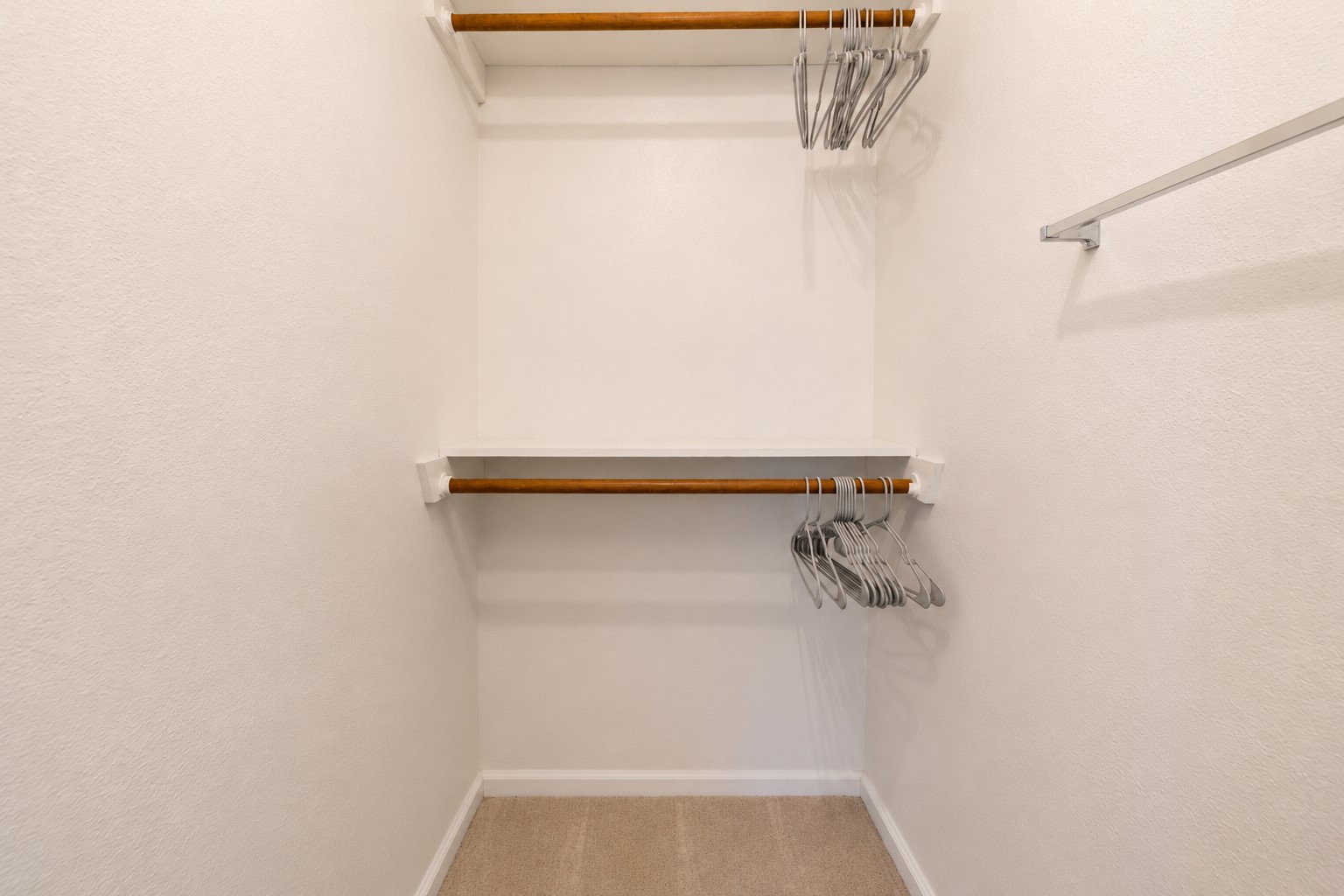 One of two nice sized walk-in closets for your primary bedroom.
