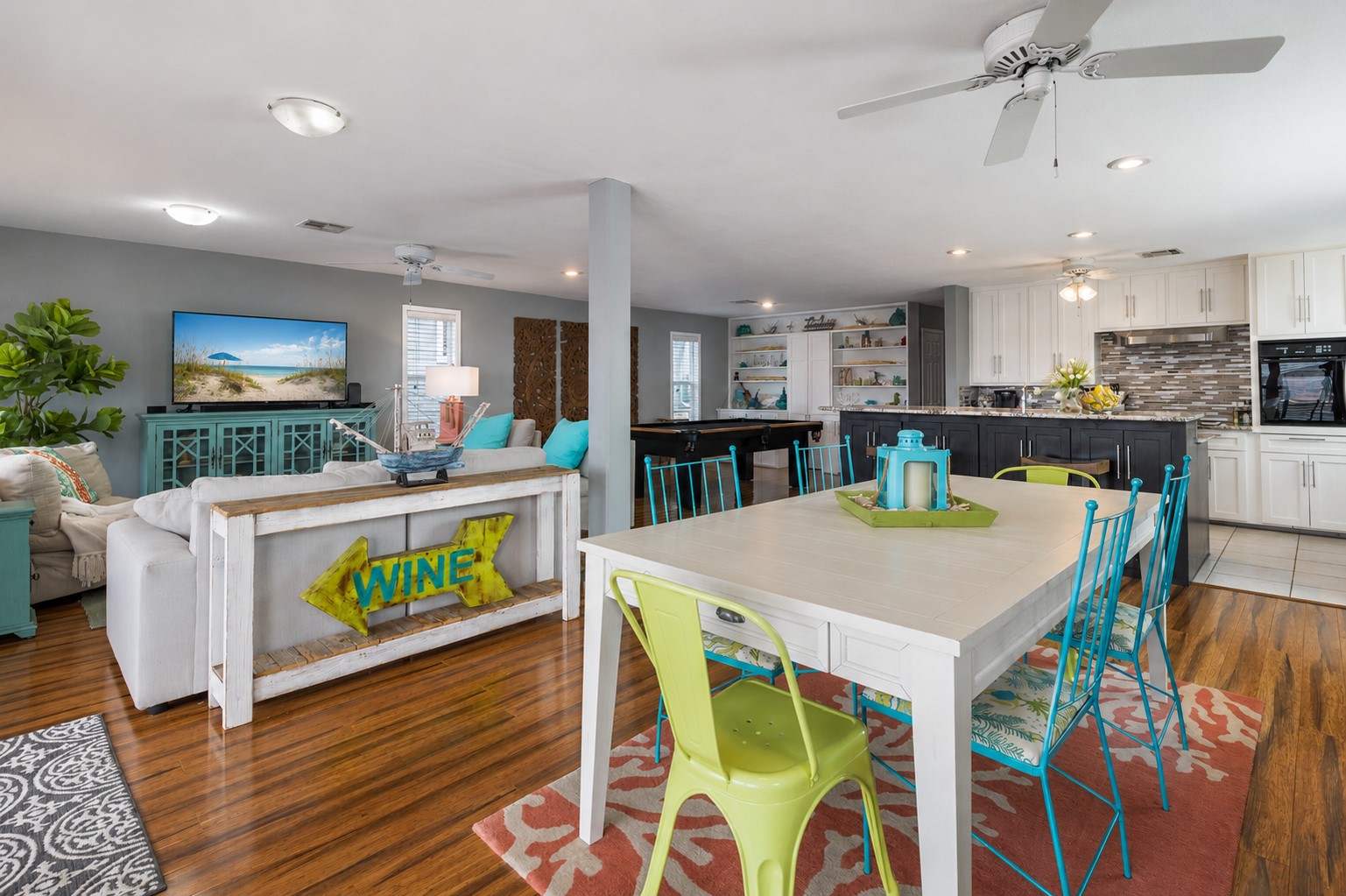 This open floorplan view flows into the living, dining and kitchen spaces. This open floorplan view flows into the living, dining and kitchen spaces.