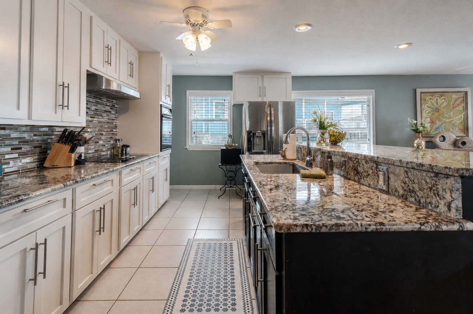 Updated countertops offer multiple work spaces.