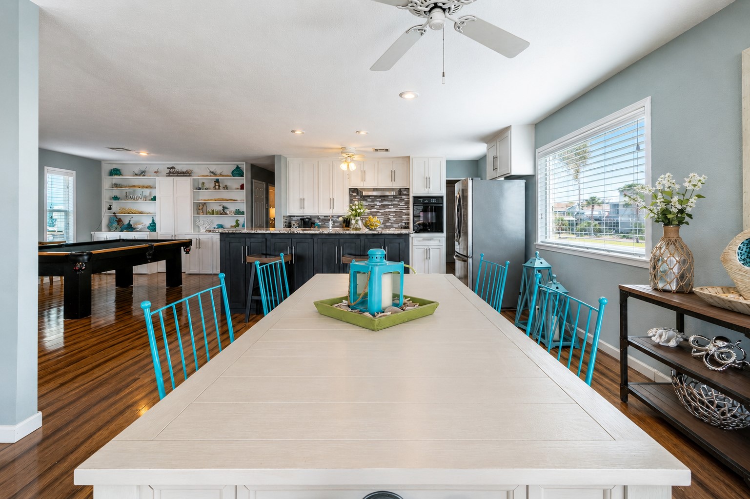 The dining space flows toward the kitchen area.