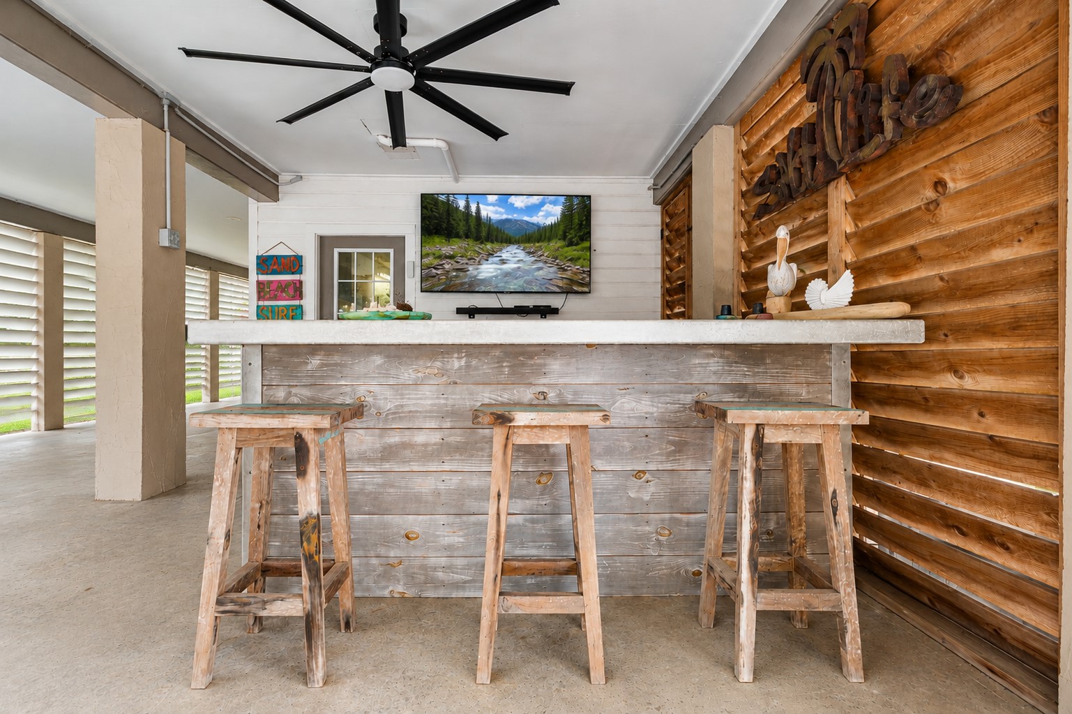 Serve up a beverage at your private coastal bar and cheer on your favorite team.