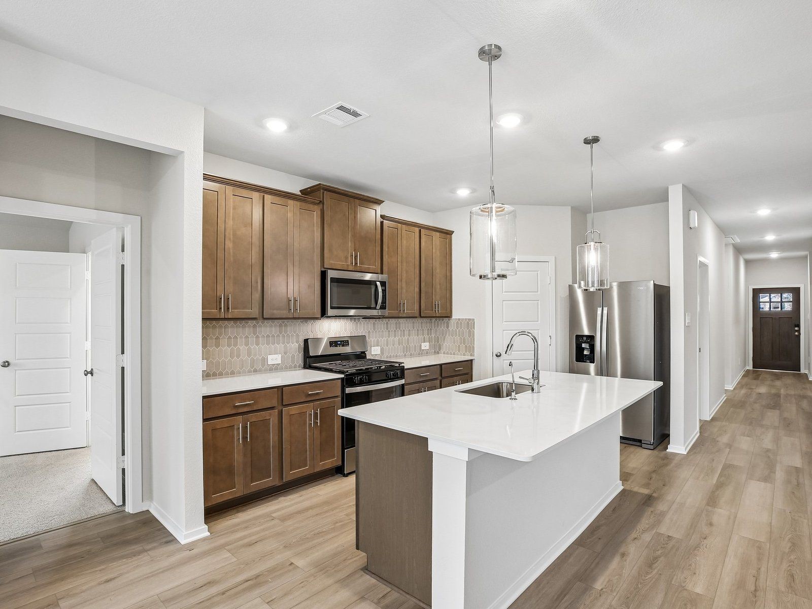 Photo is not of actual model home, but is a inspirational photo of builder's model home and may depict furnishings, options, and decorator features that are not included.
