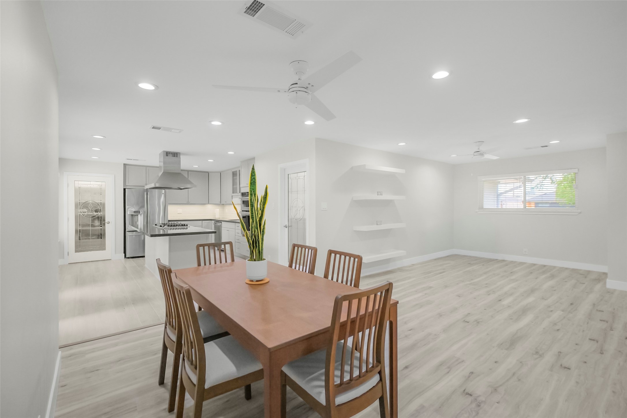 Dining room-kitchen combo makes an easy flow to and from. Dining room-kitchen combo makes an easy flow to and from.